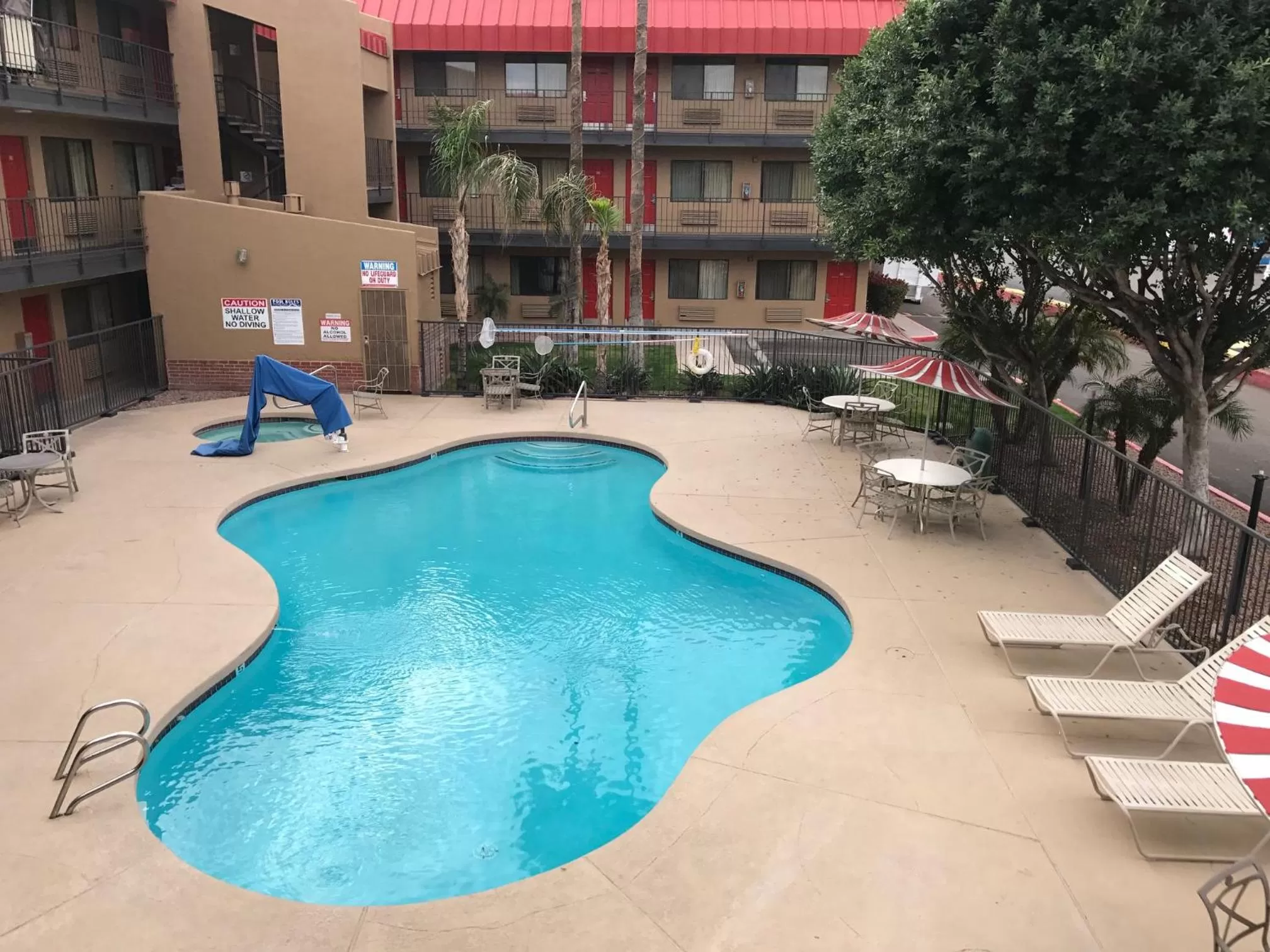 Swimming pool in Travelers Inn - Phoenix