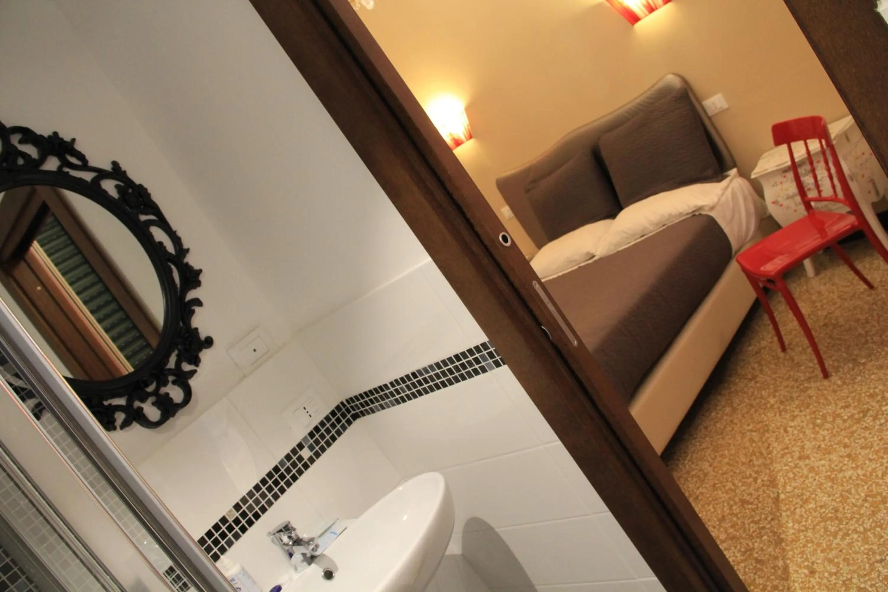 Decorative detail, Bed in Hotel Bologna