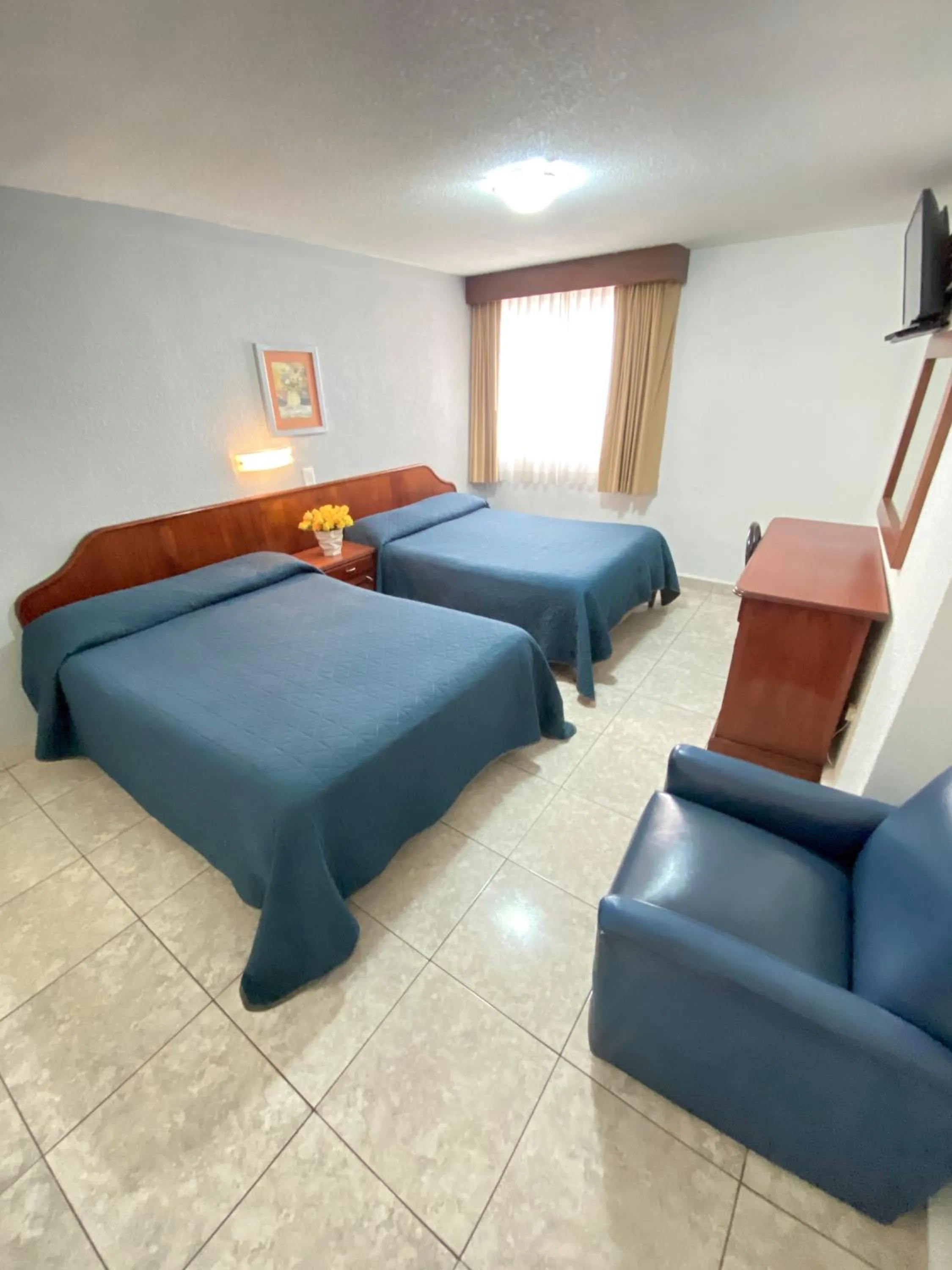 Bed in Hotel Qualitel Plus