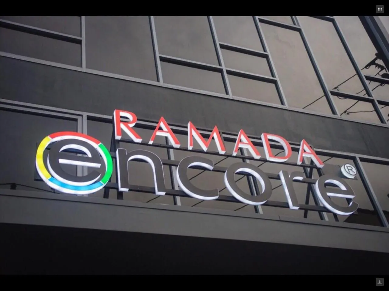 Property logo or sign in Ramada Encore by Wyndham Makati