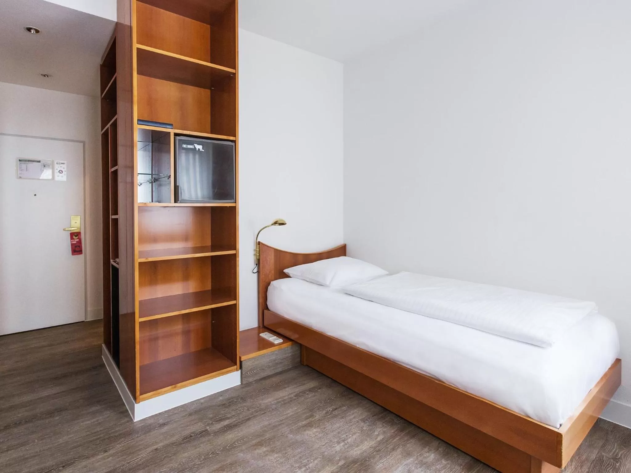 Photo of the whole room, Bed in DORMERO Hotel Dresden Airport