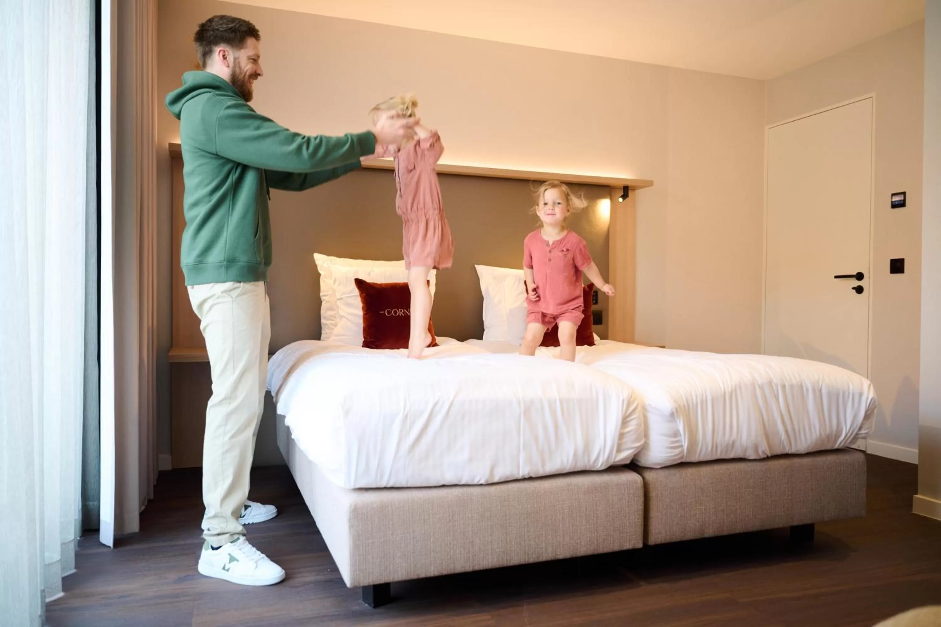 Bed in The CORNR Hotel