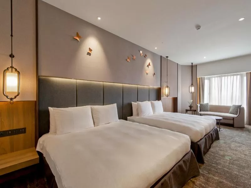 Bed in The Howard Prince Hotel Taichung