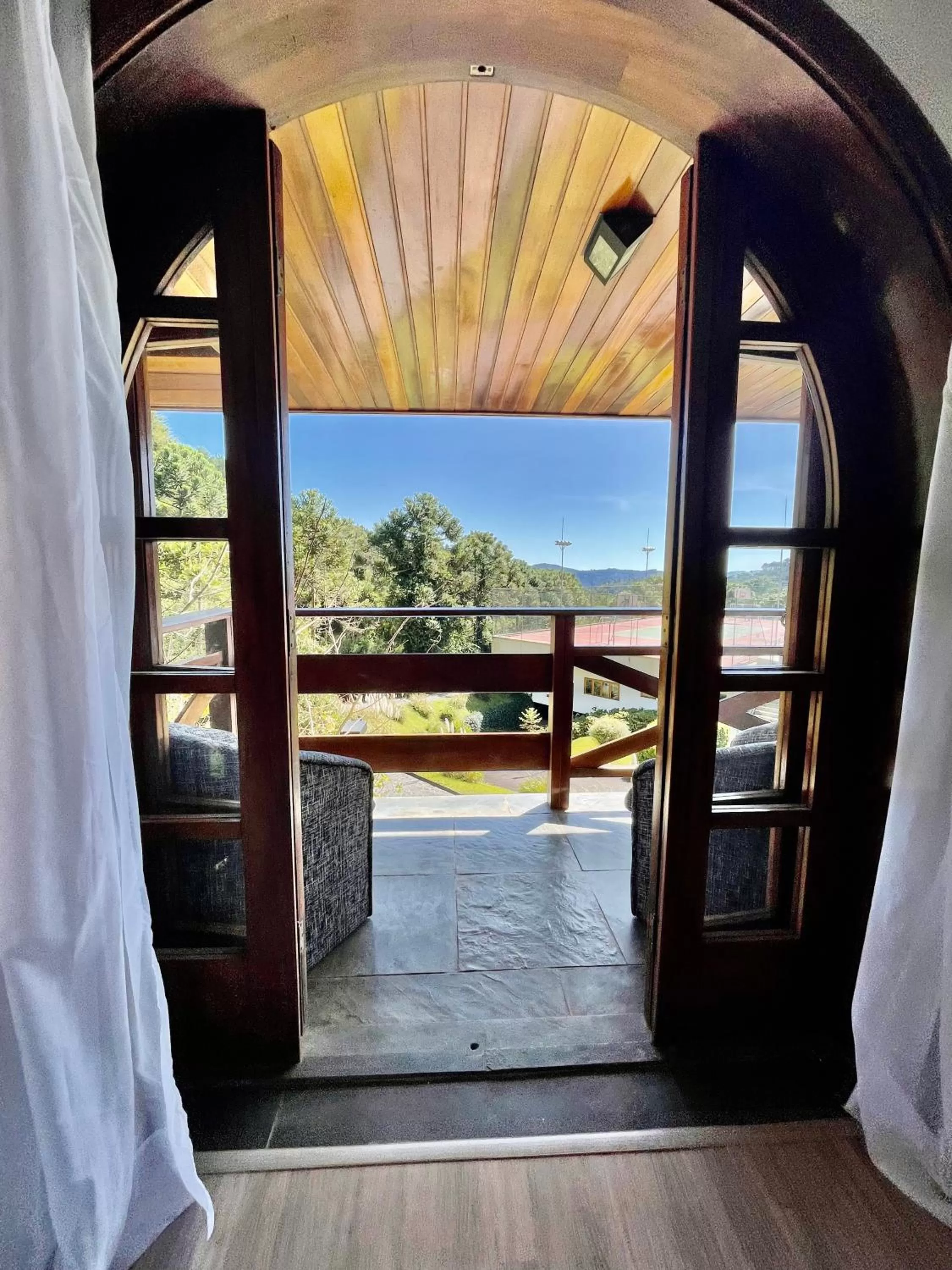 Balcony/Terrace in MineirINN l Piscina Aquecida e Hidro na Montanha