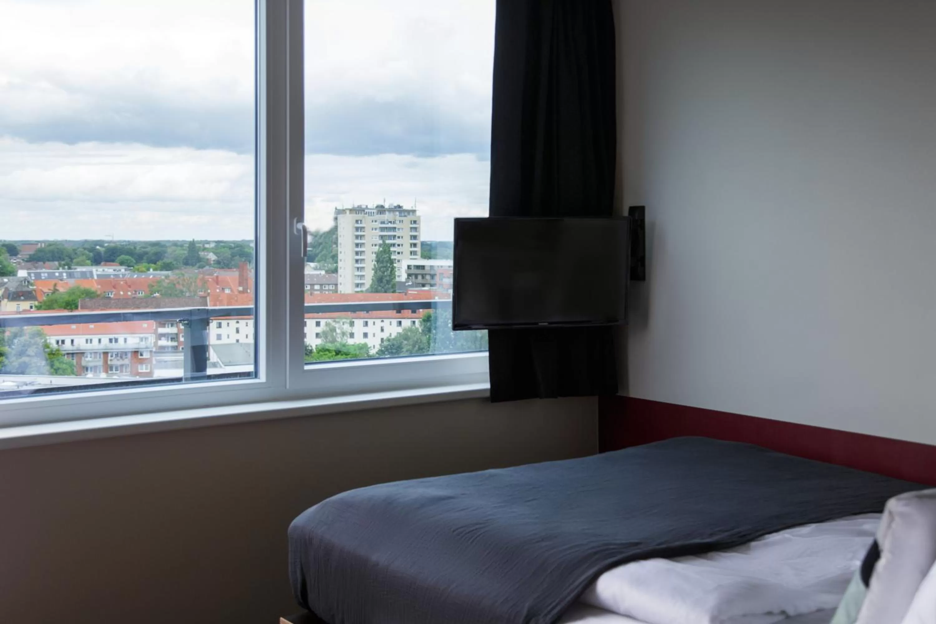 Bed in Base Apartments