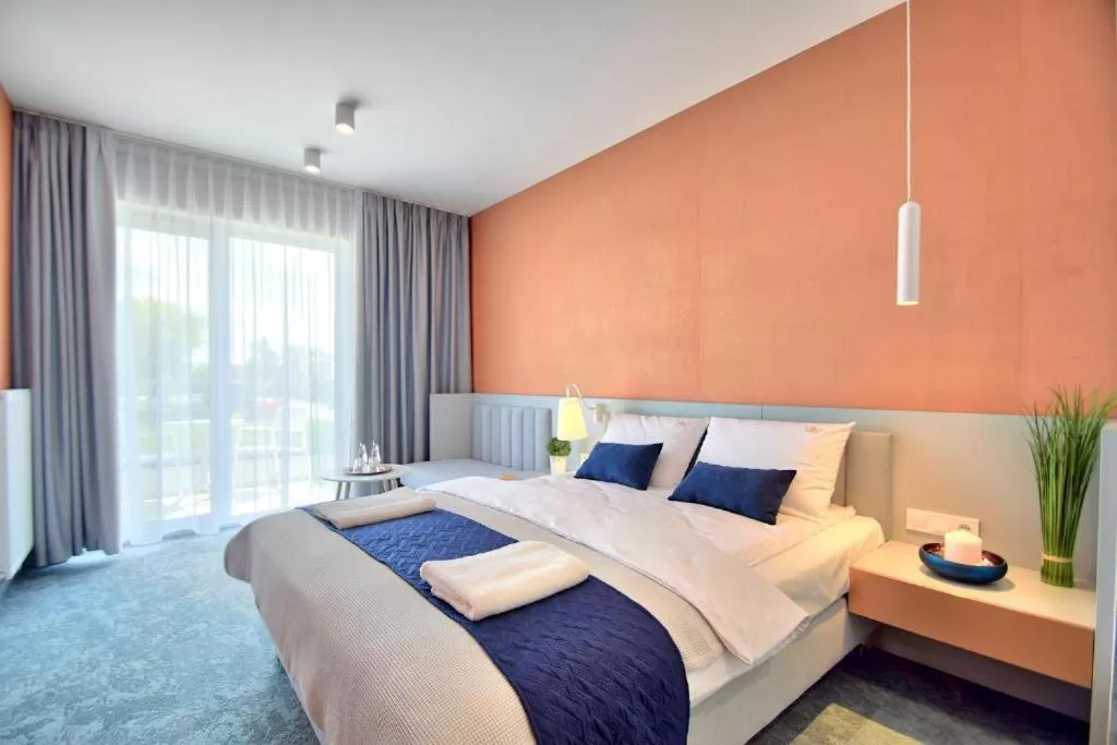 Photo of the whole room, Bed in Savana Resort Mielno