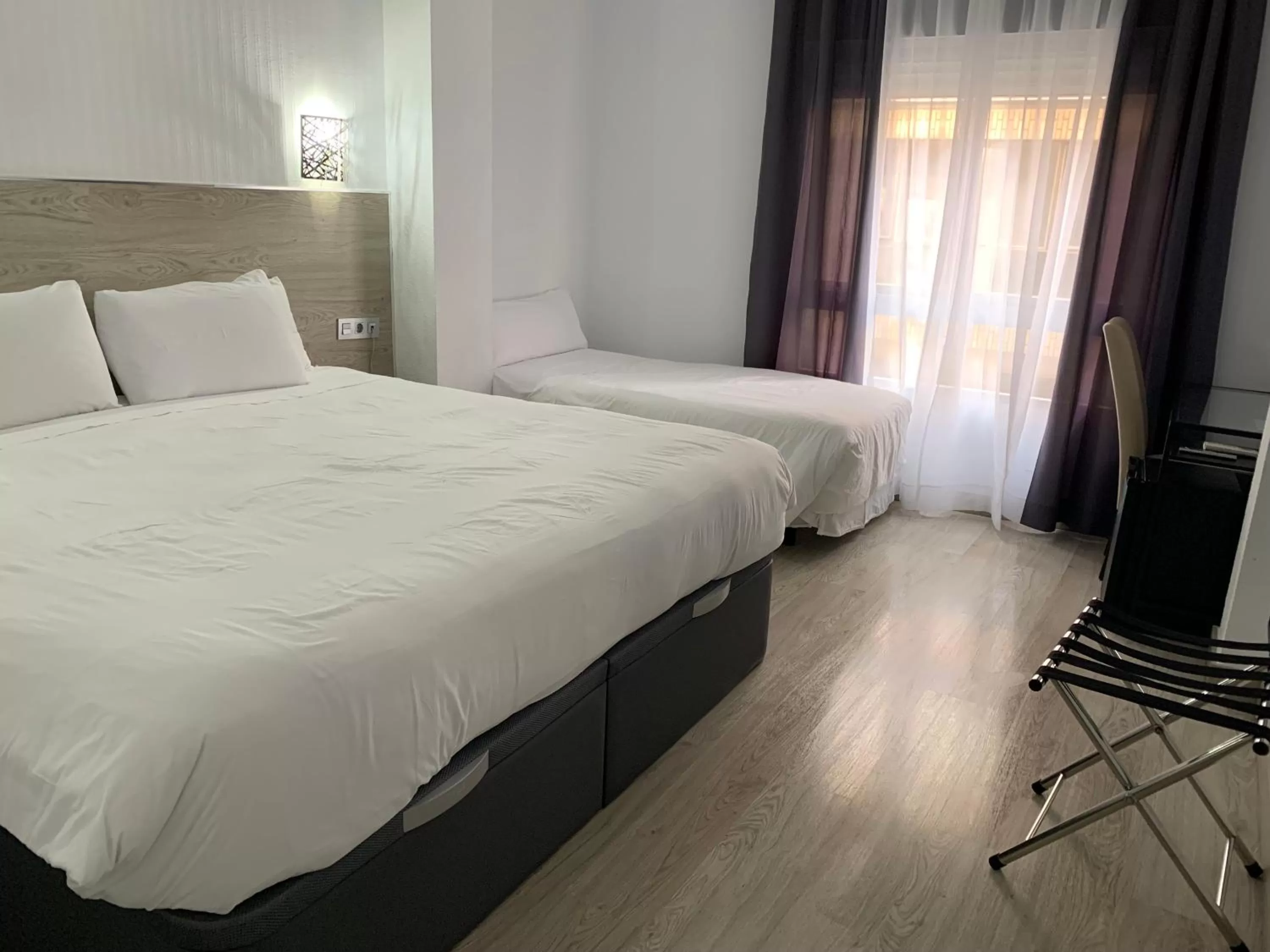 Bed in Hotel Carlos III