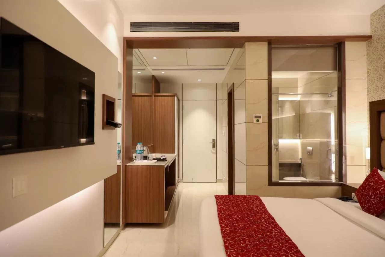 Bed in Hotel Gurudev Grand