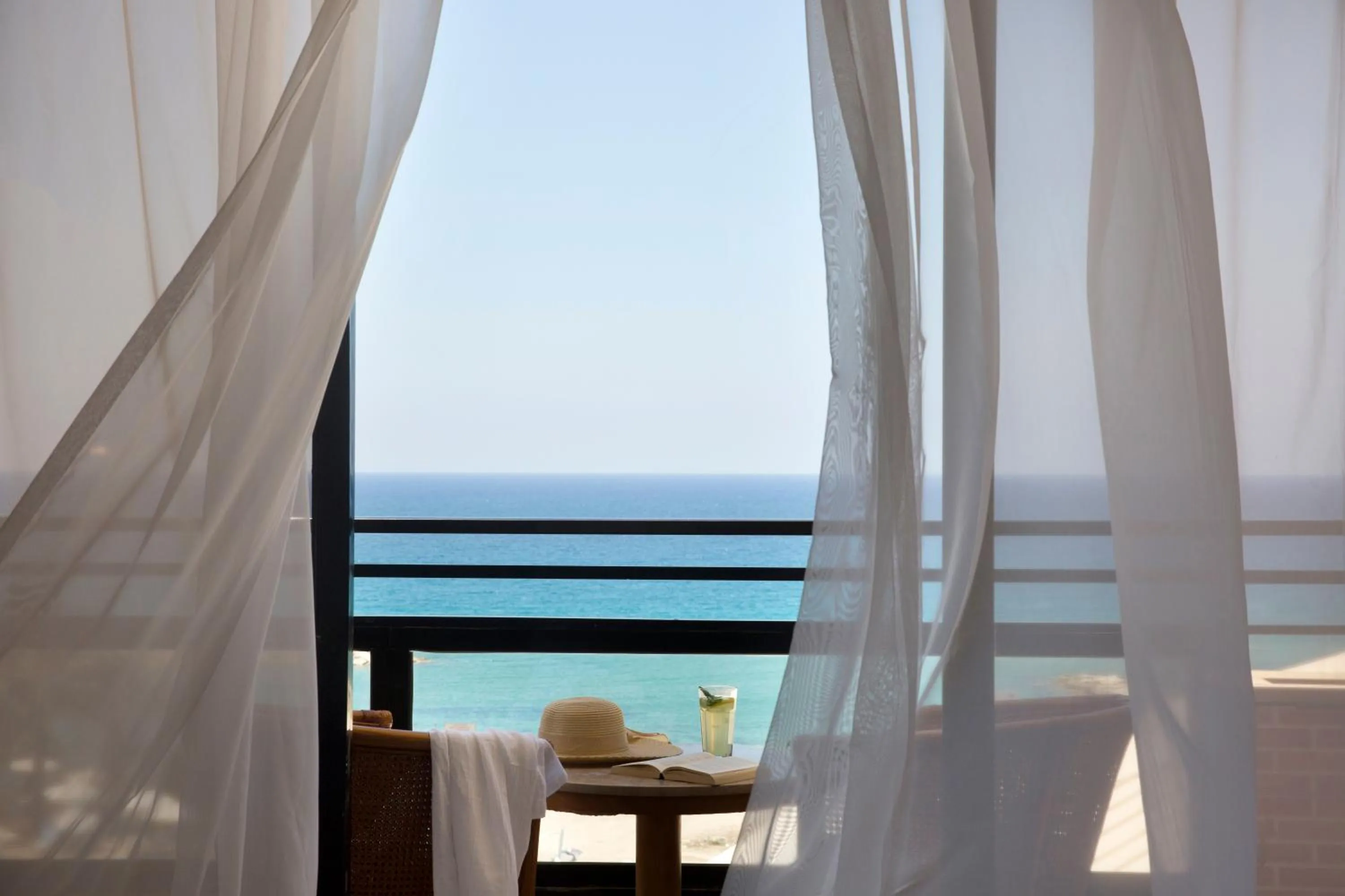 Balcony/Terrace, Bed in Venus Beach Hotel