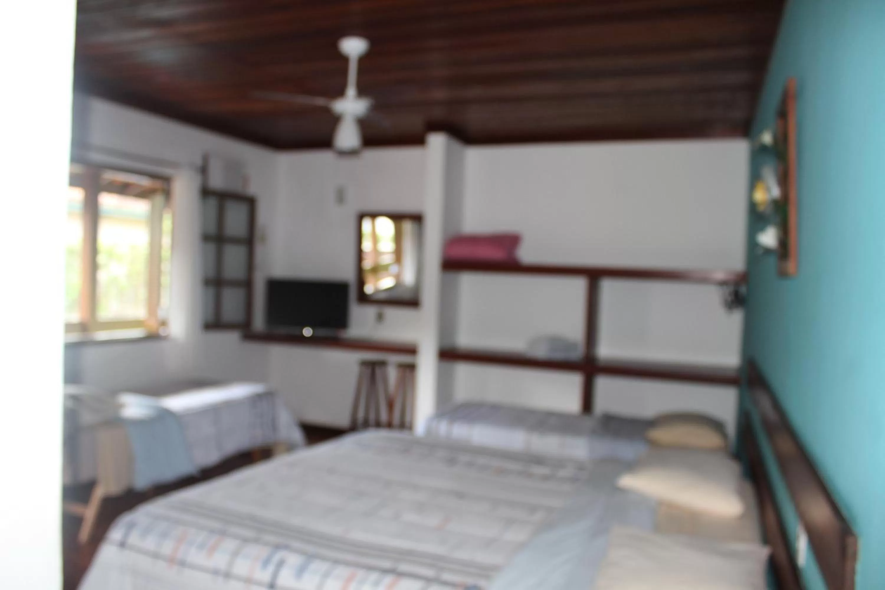 Bed in Pousada Flor de Paraty