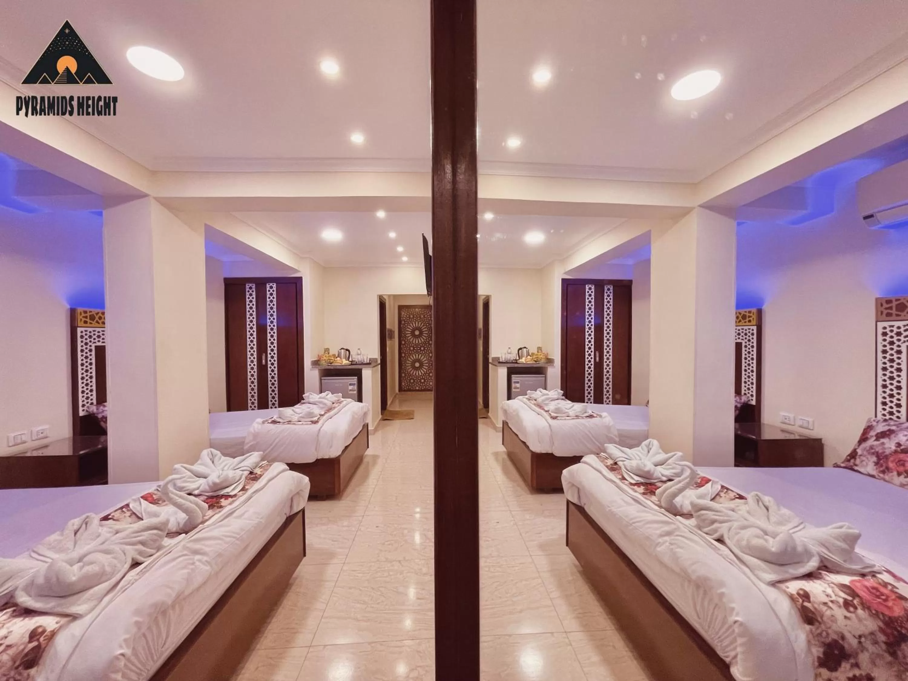 Bed in Pyramids Height Hotel & Pyramids Master Scene Rooftop