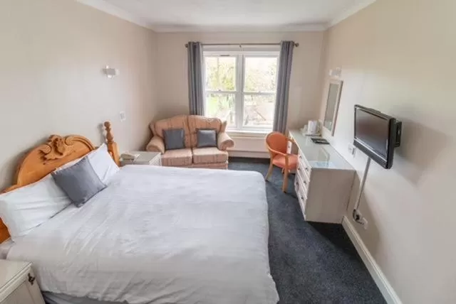 Bed in The Quorn Lodge Hotel