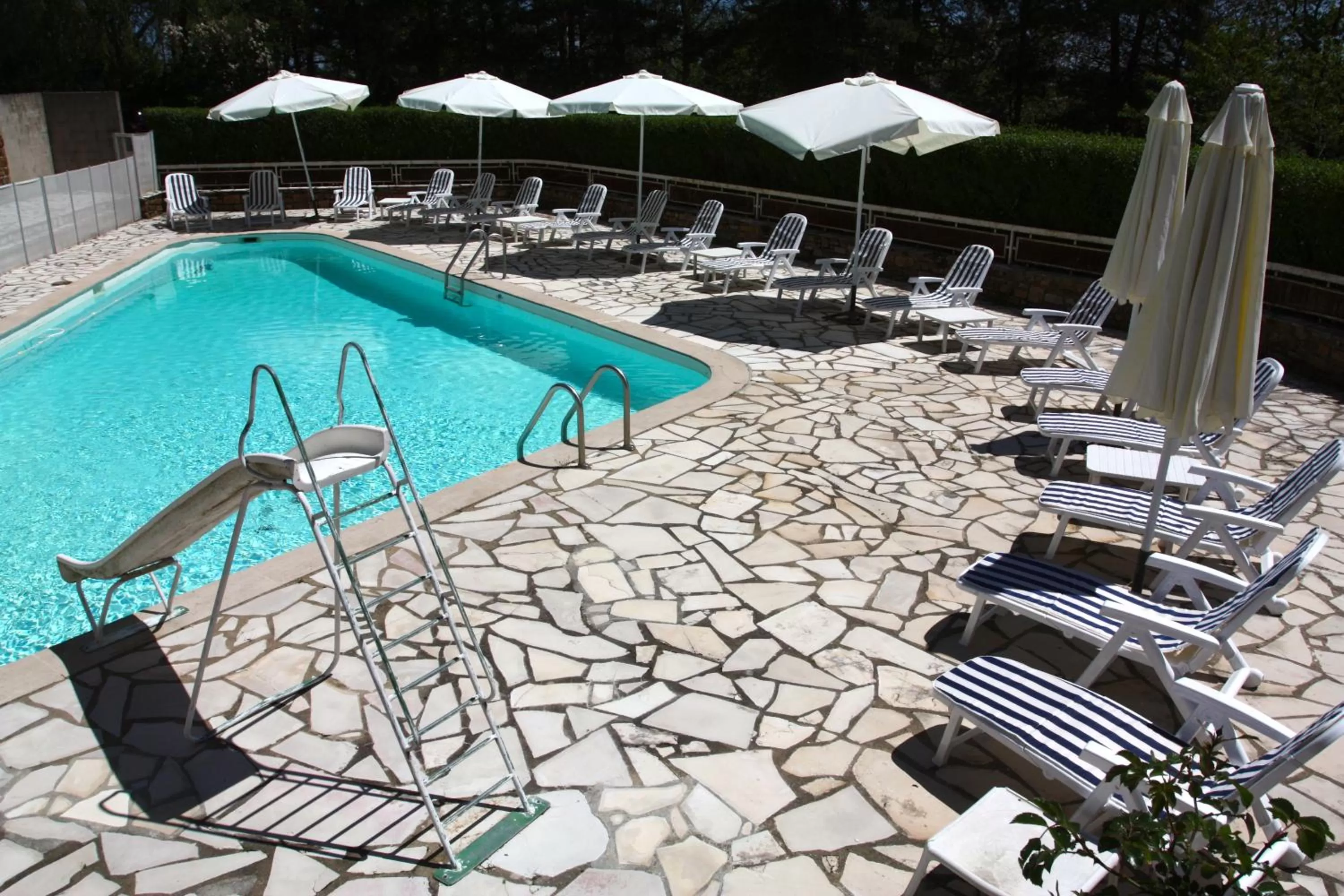 Swimming pool in authentic by balladins – Rodez / Le Ségala