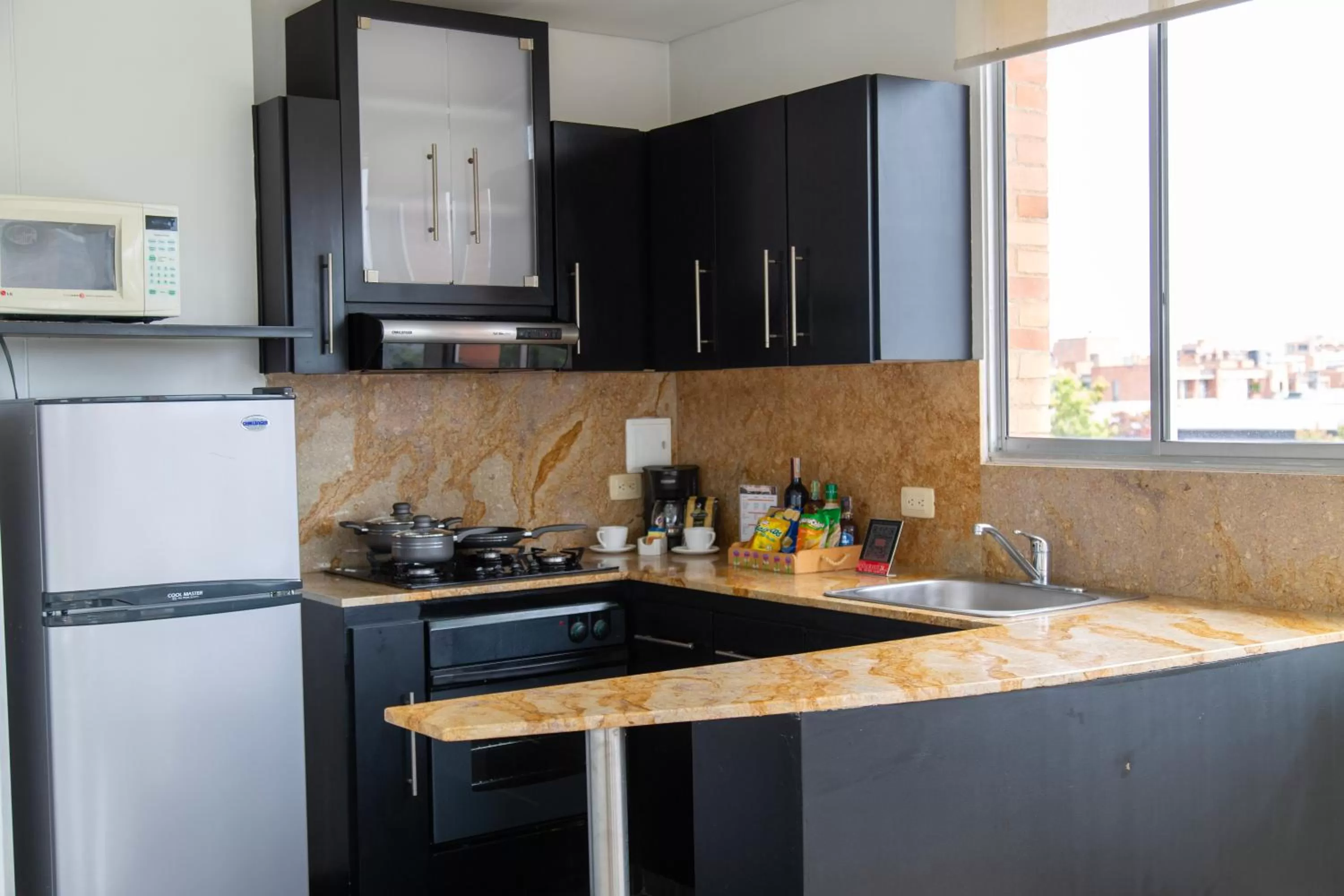 Kitchen or kitchenette in Hotel 104 Art Suites