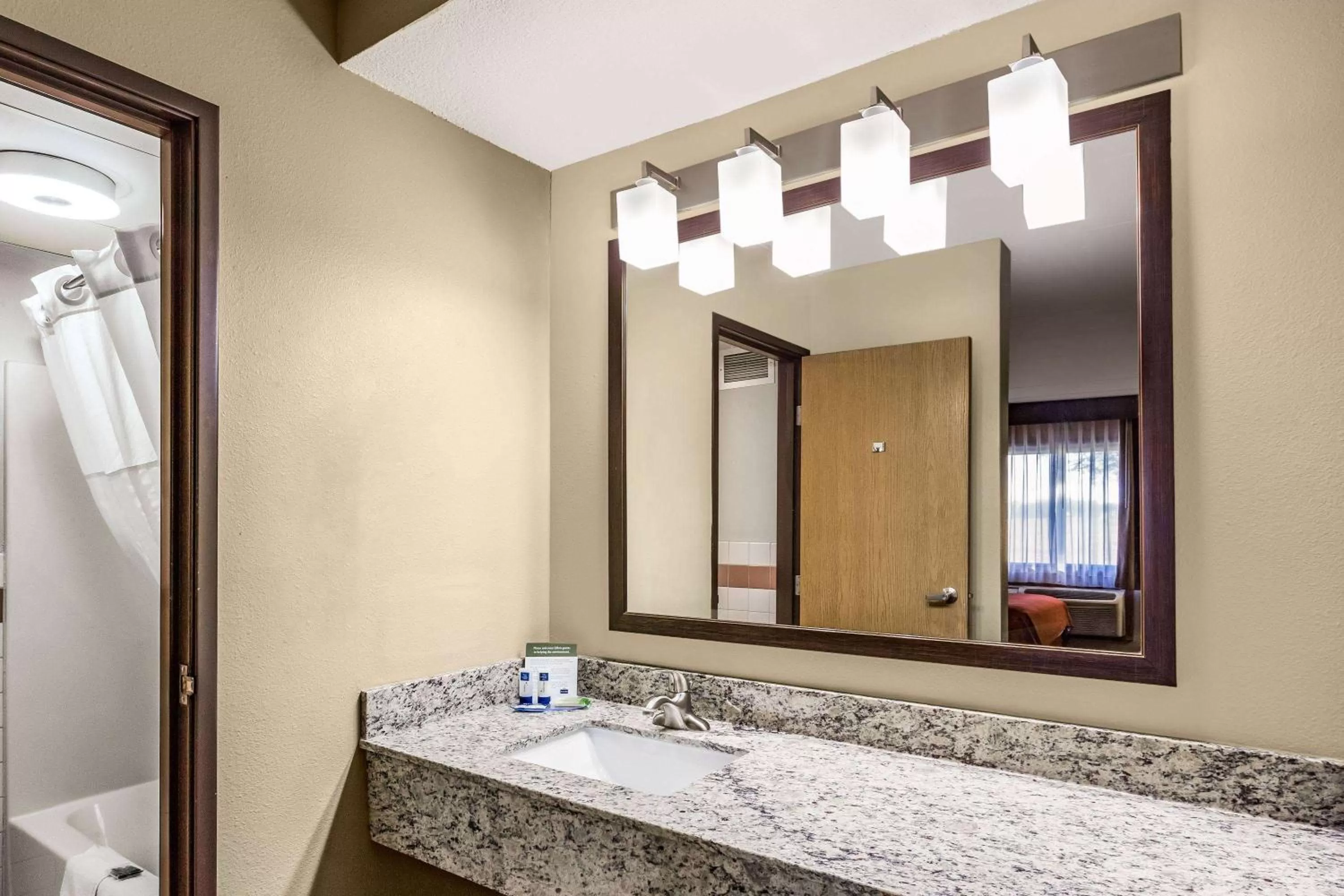 Bathroom in AmericInn by Wyndham Blue Earth