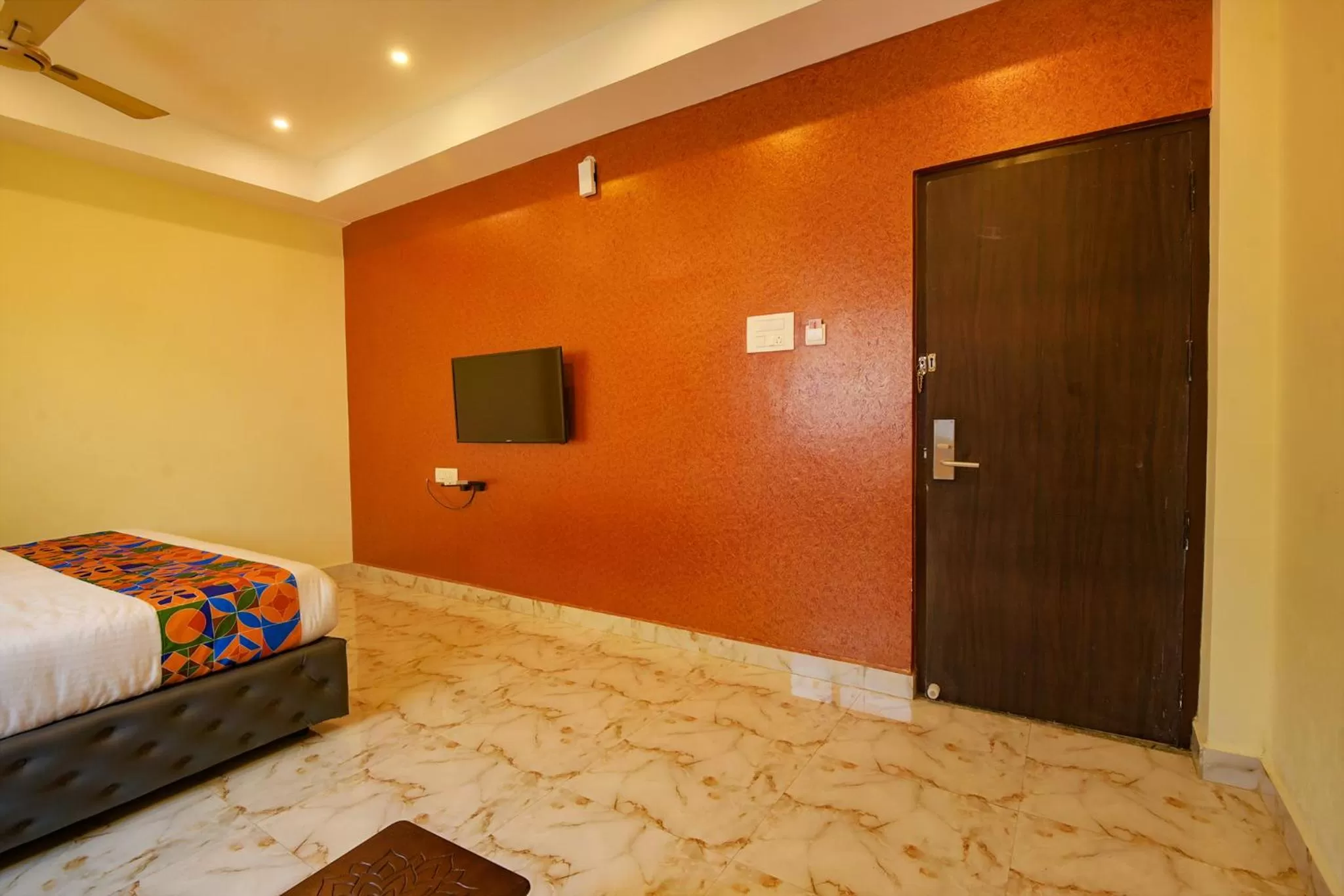 Bed in FabHotel The Fortune Inn