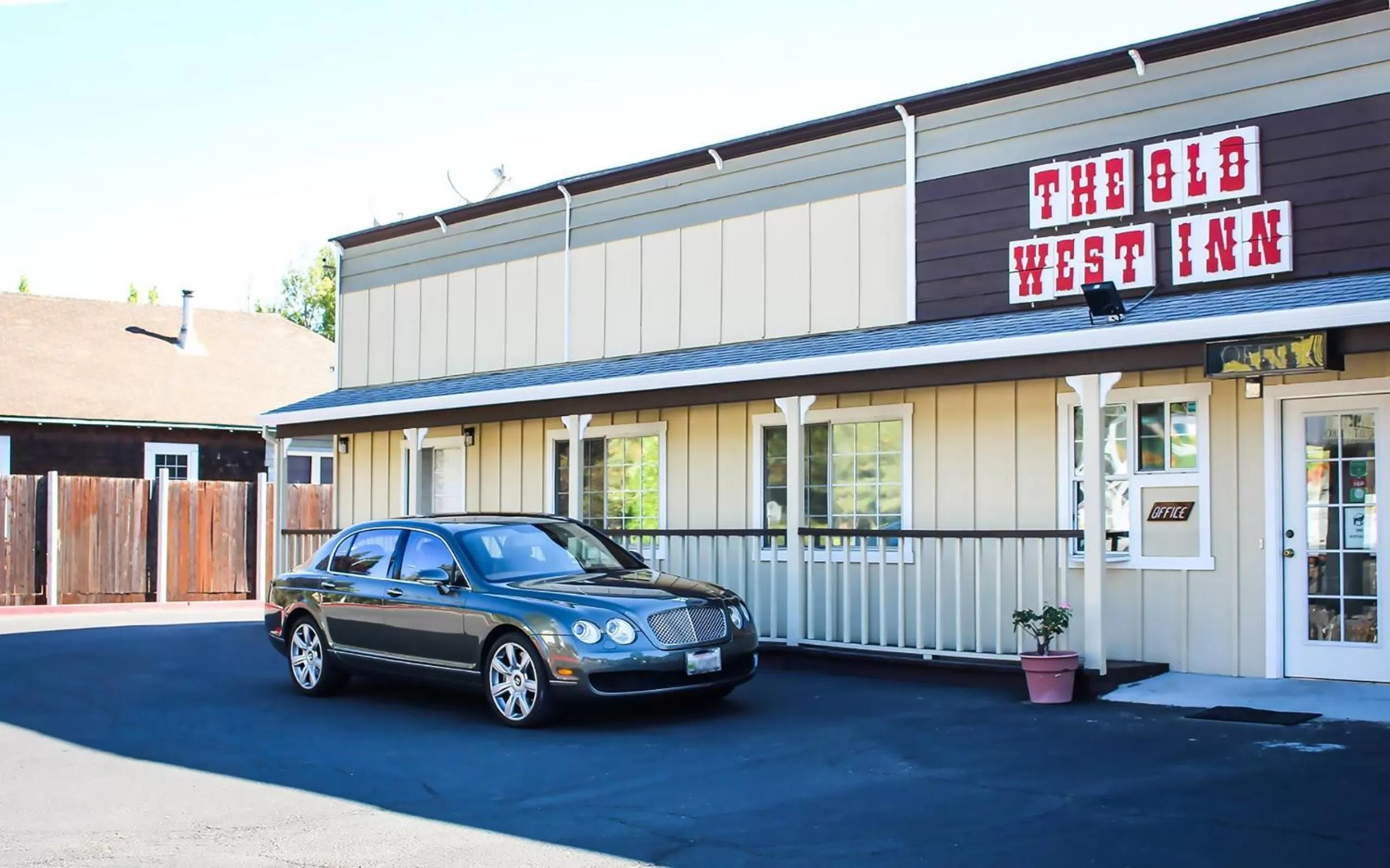 Property logo or sign in The Old West Inn