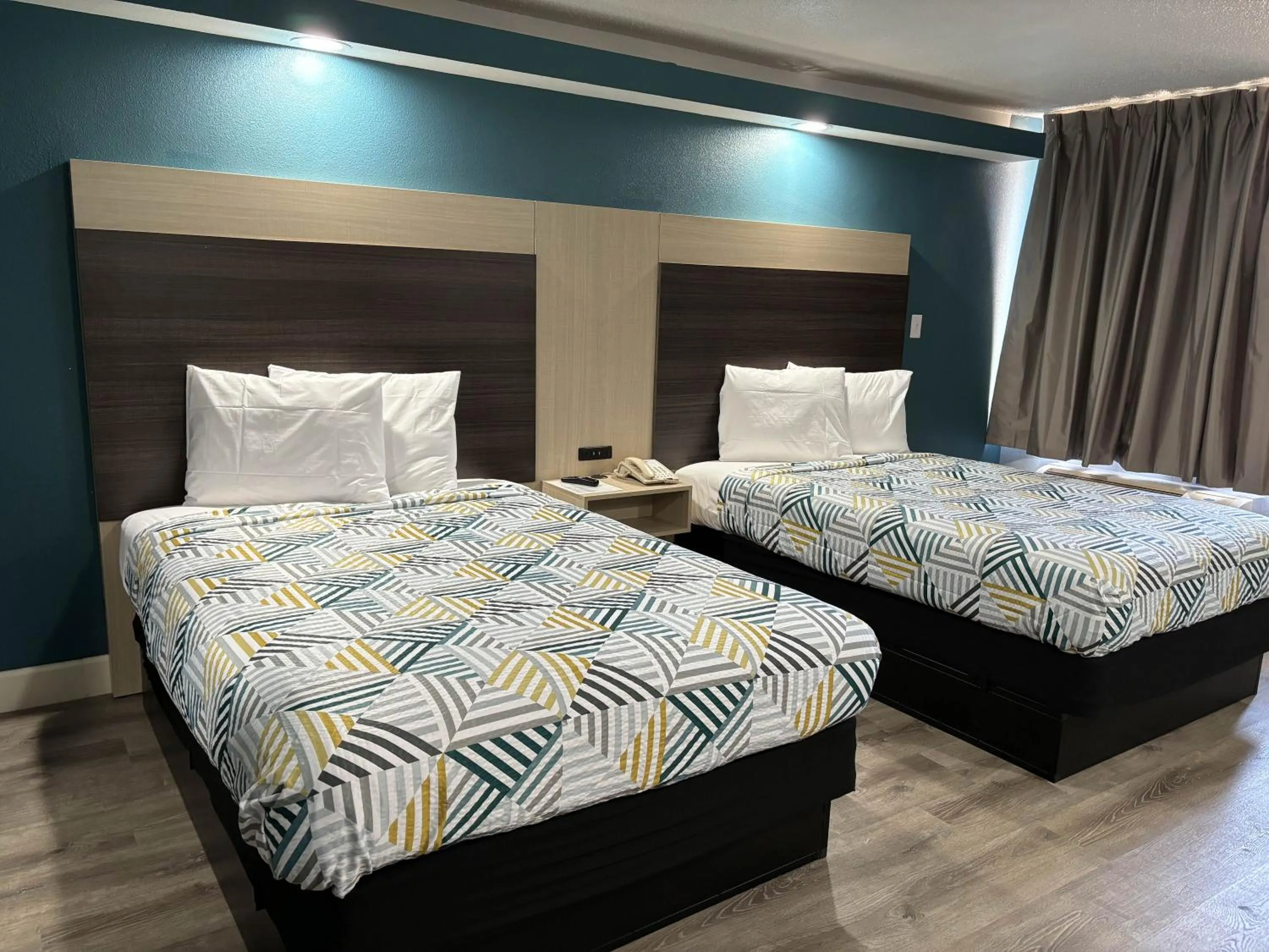 Bedroom, Bed in Studio 6 Suites Memphis, TN East Memphis