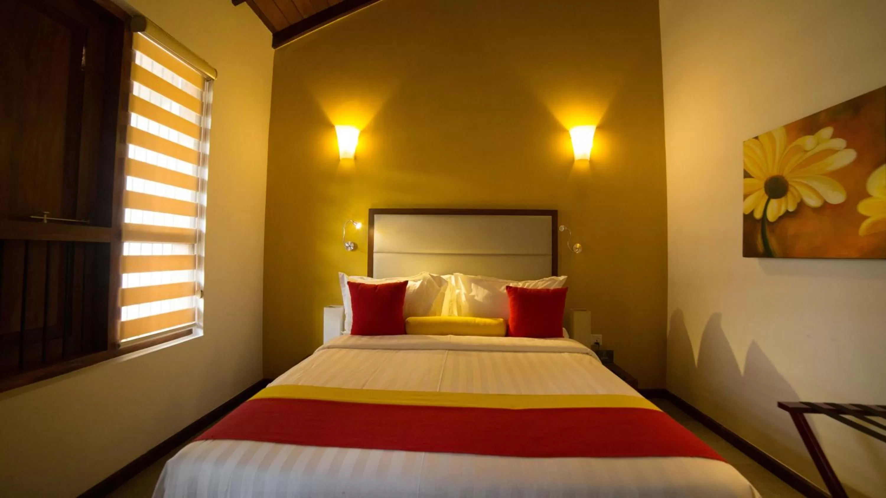 Bed in The Thinnai - All-Suites Boutique Hotel