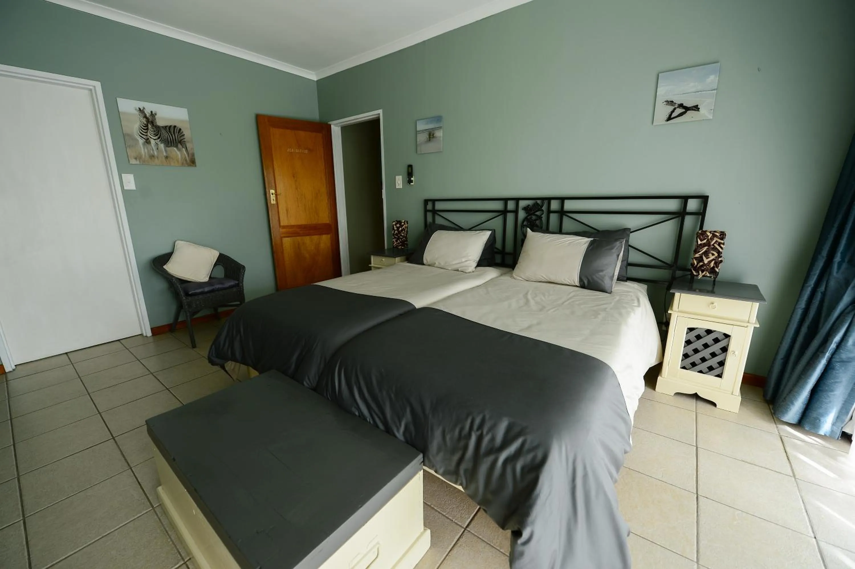 Bed in De Wingerd Wijnland Lodge