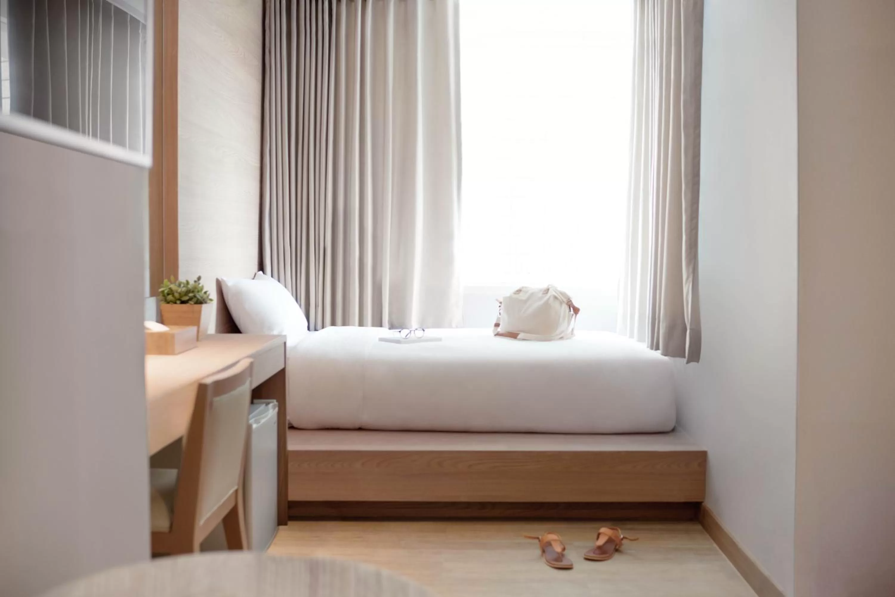 Bed in Kritthai Residence