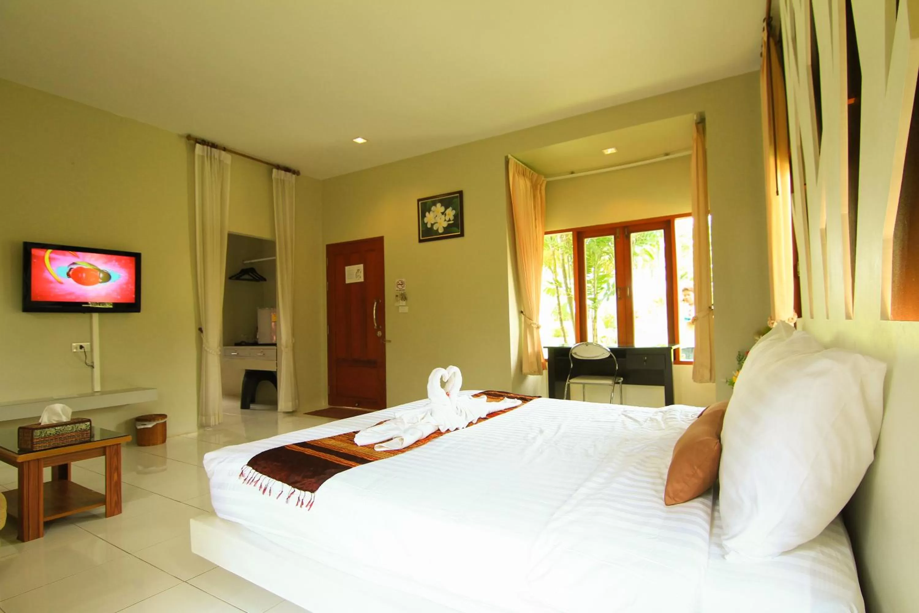 Bed in Panlaan Boutique Resort