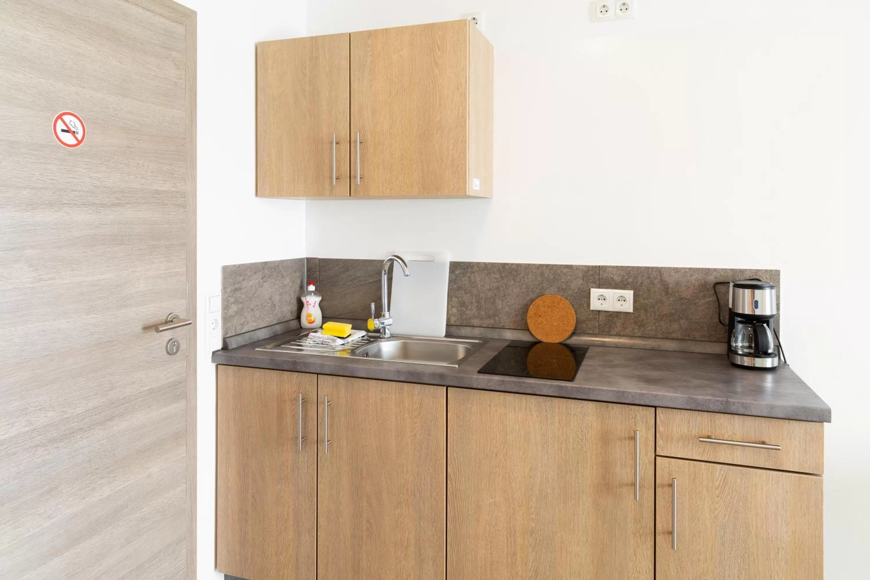 Kitchen or kitchenette in Green Guest House