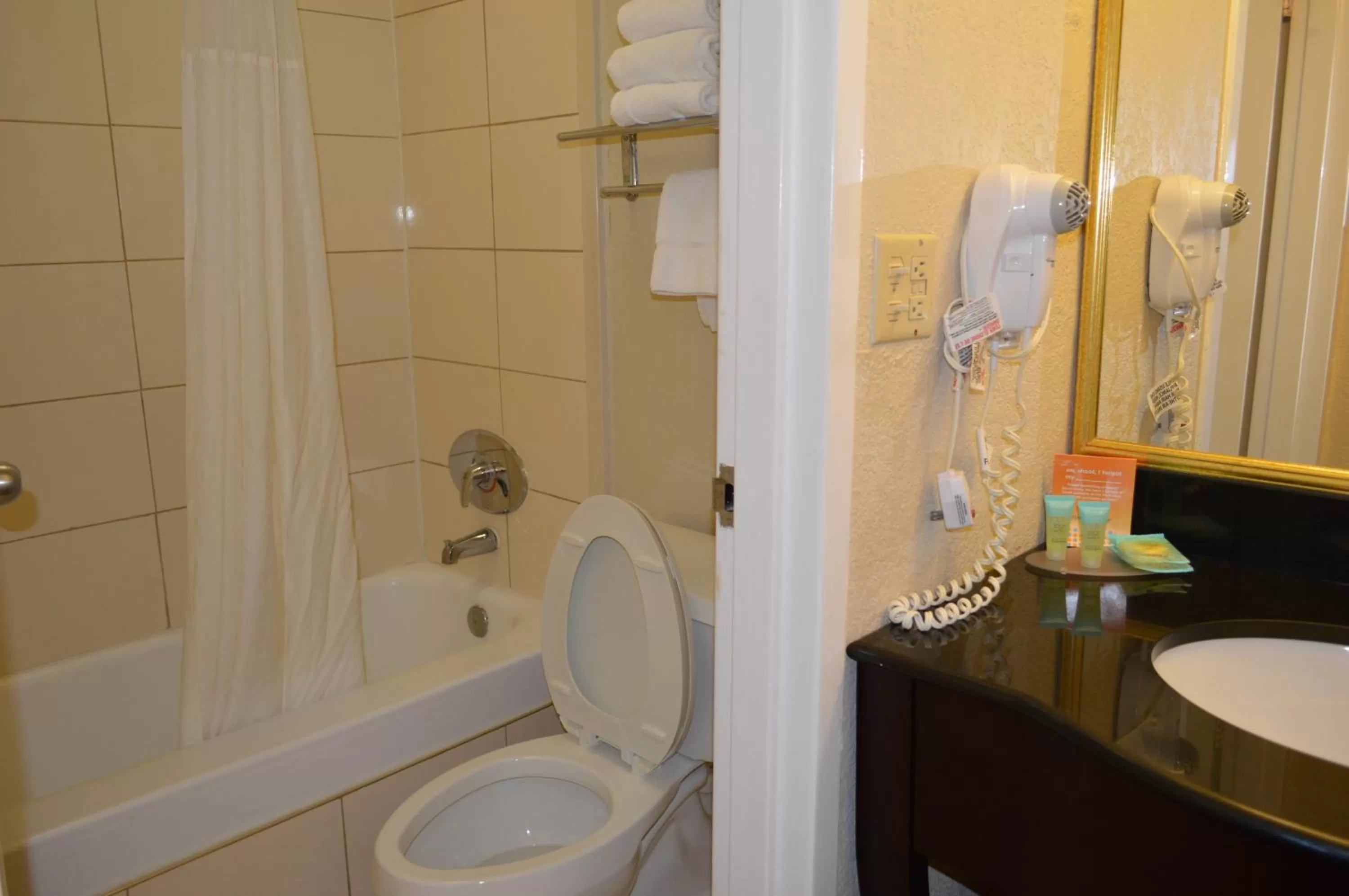 Toilet in Opal Hotel & Suites