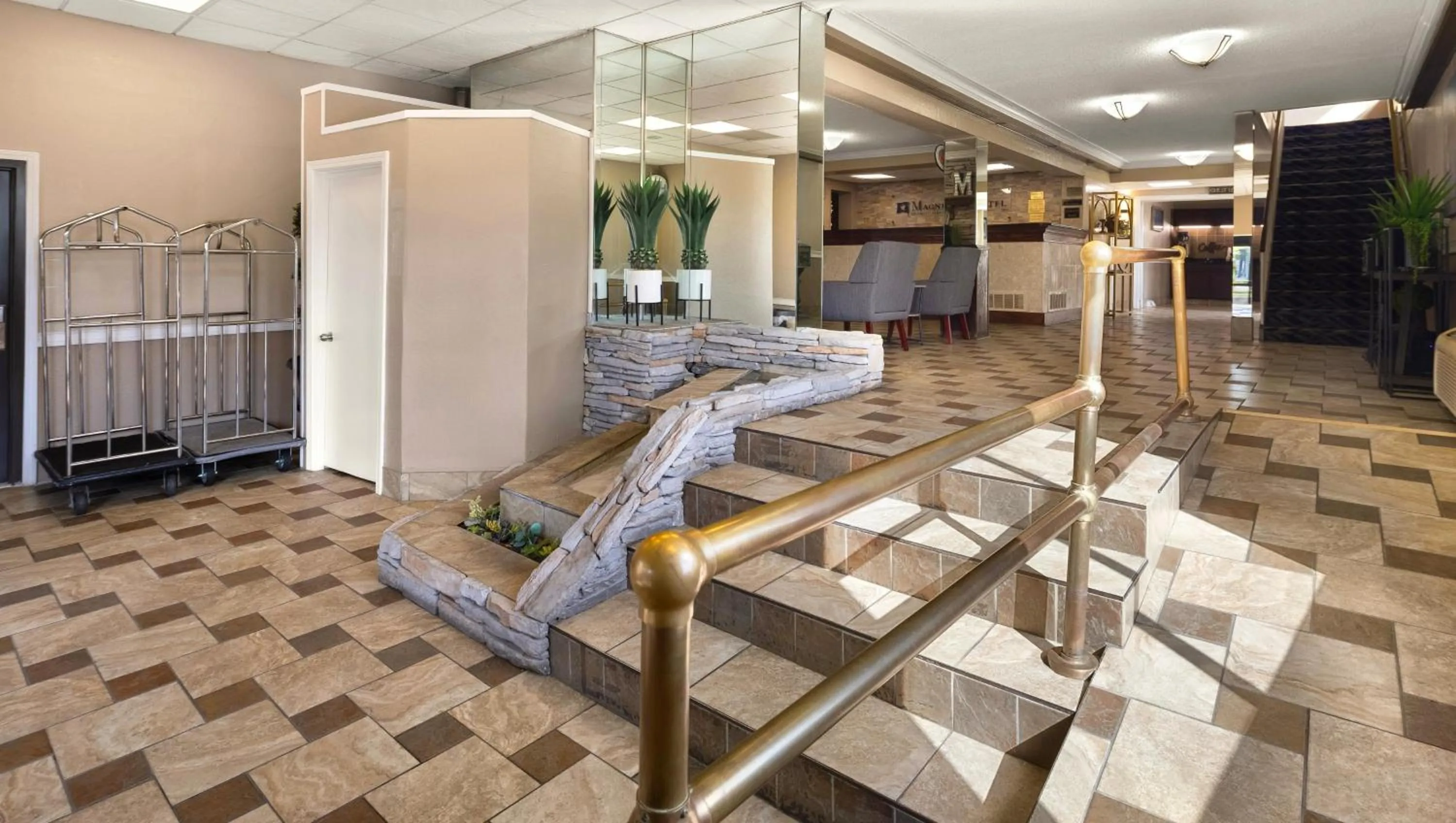 Lobby or reception in Magnuson Hotel Detroit Airport