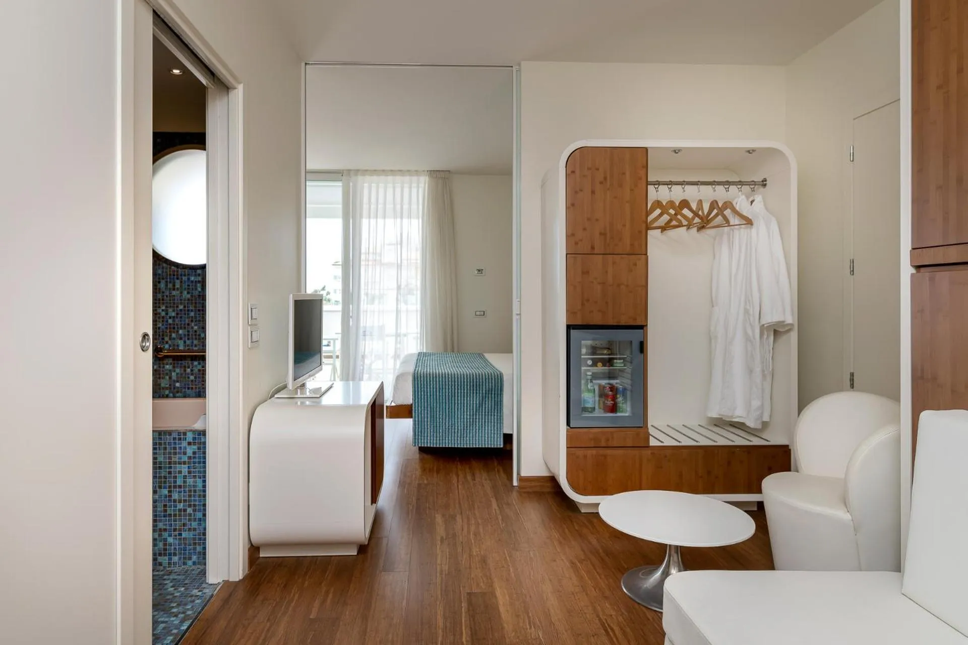 Bed in T-Suite Hotel