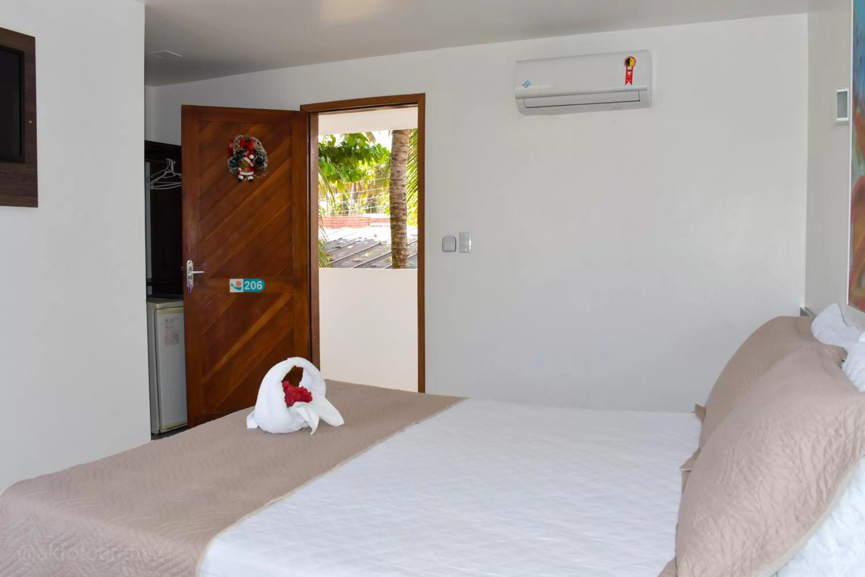 Bed in Pousada Sol e Mar