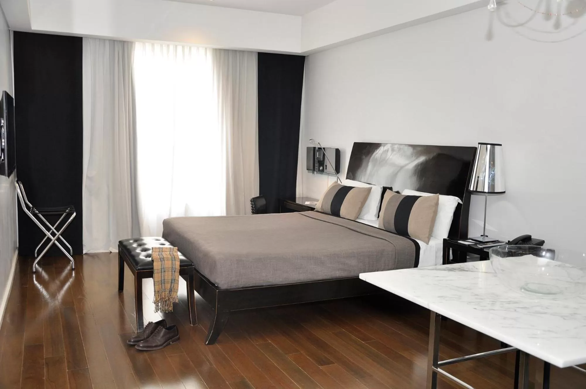 Decorative detail, Bed in Broadway Hotel & Suites