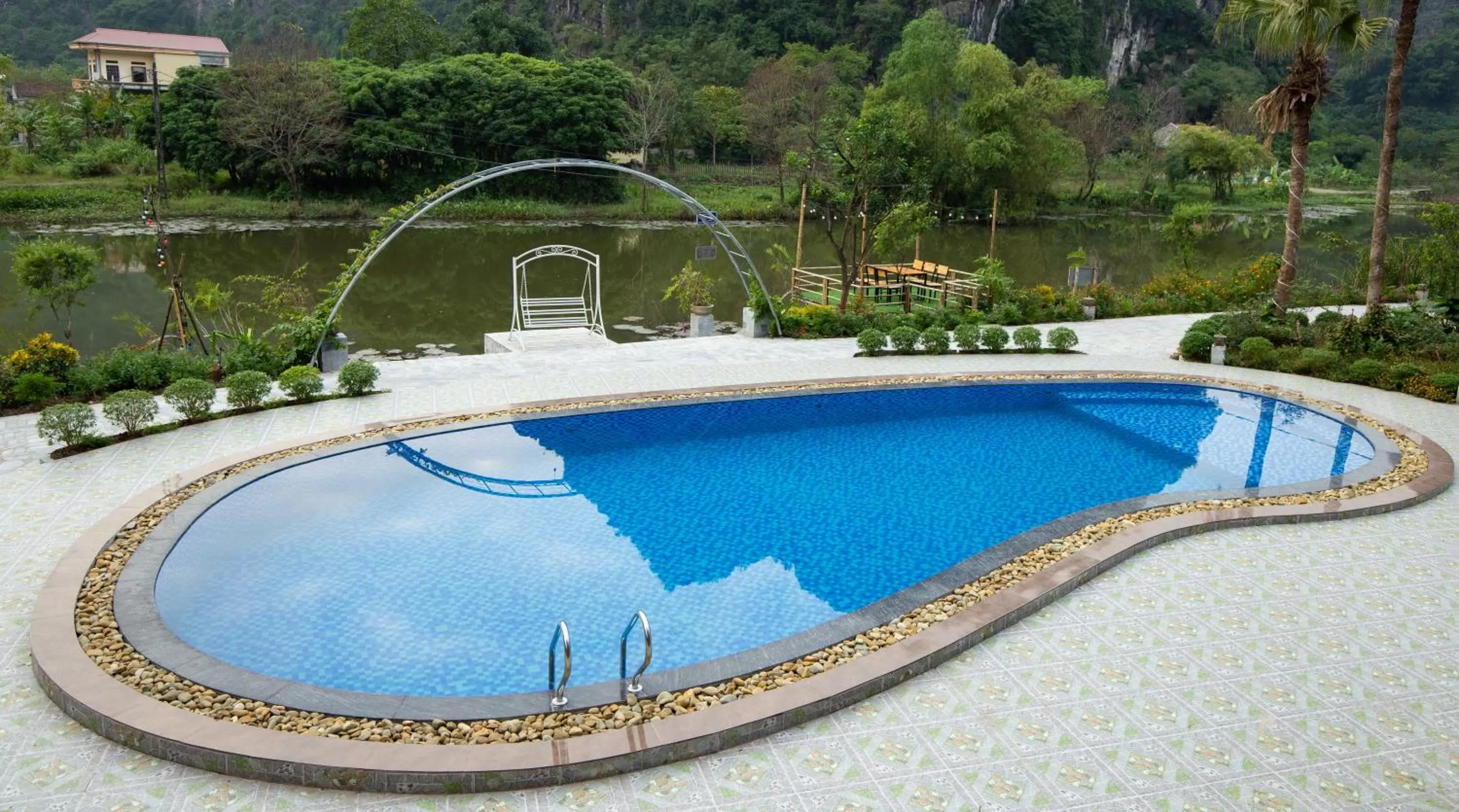 Swimming pool in HoangLong Riverside Homestay