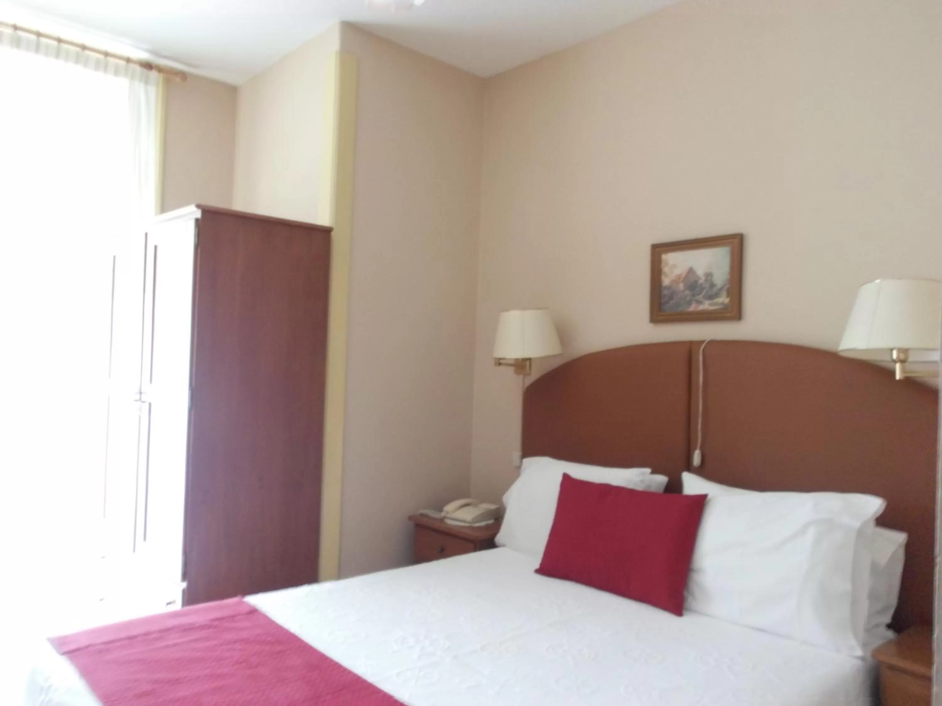 Bed in Hotel Larbelo