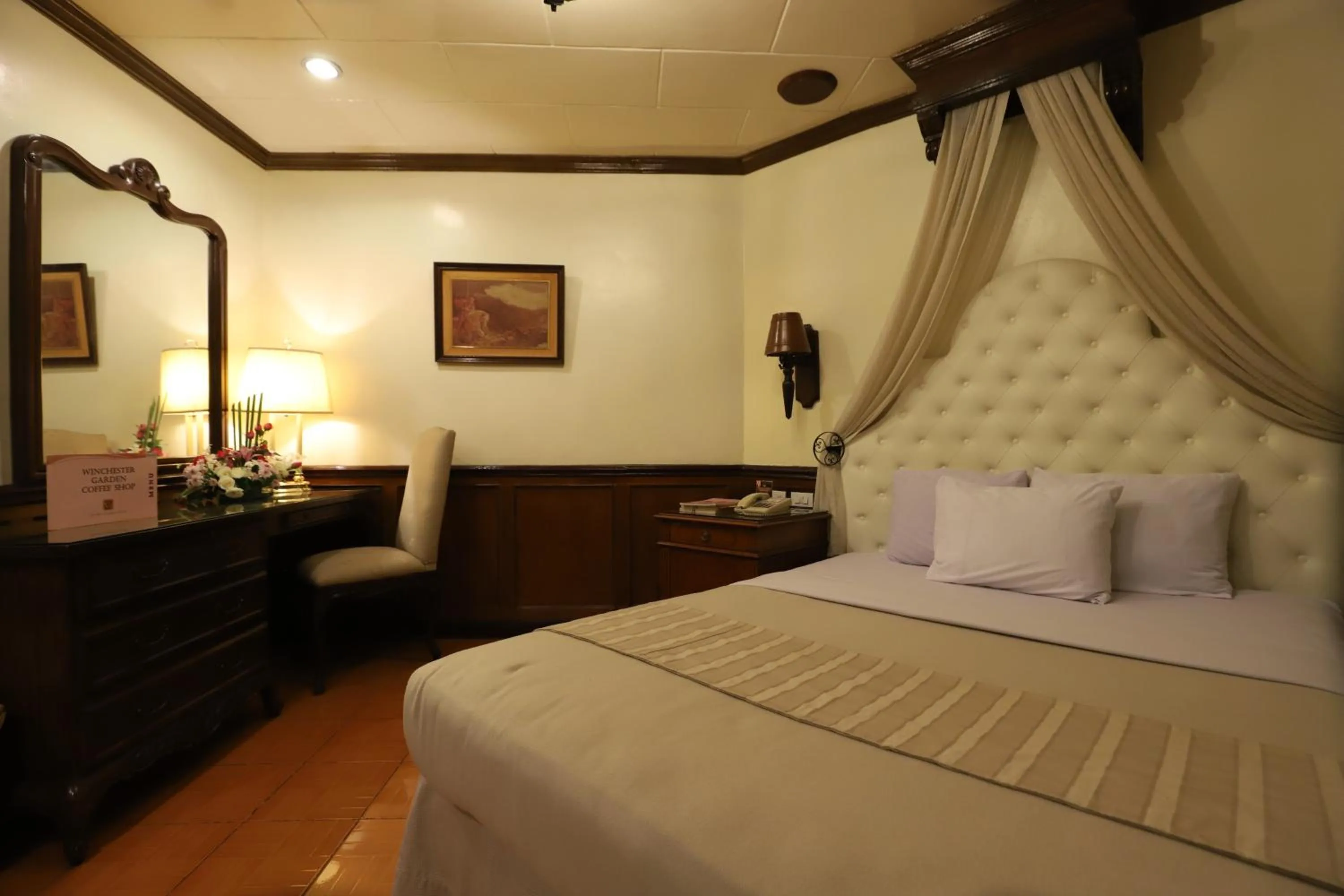 Bed in Camelot Hotel