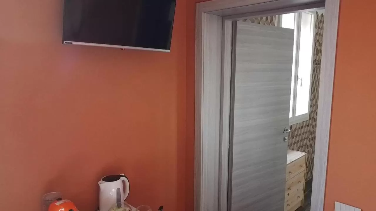 TV/Entertainment Center in Sala dell Estate Guest House