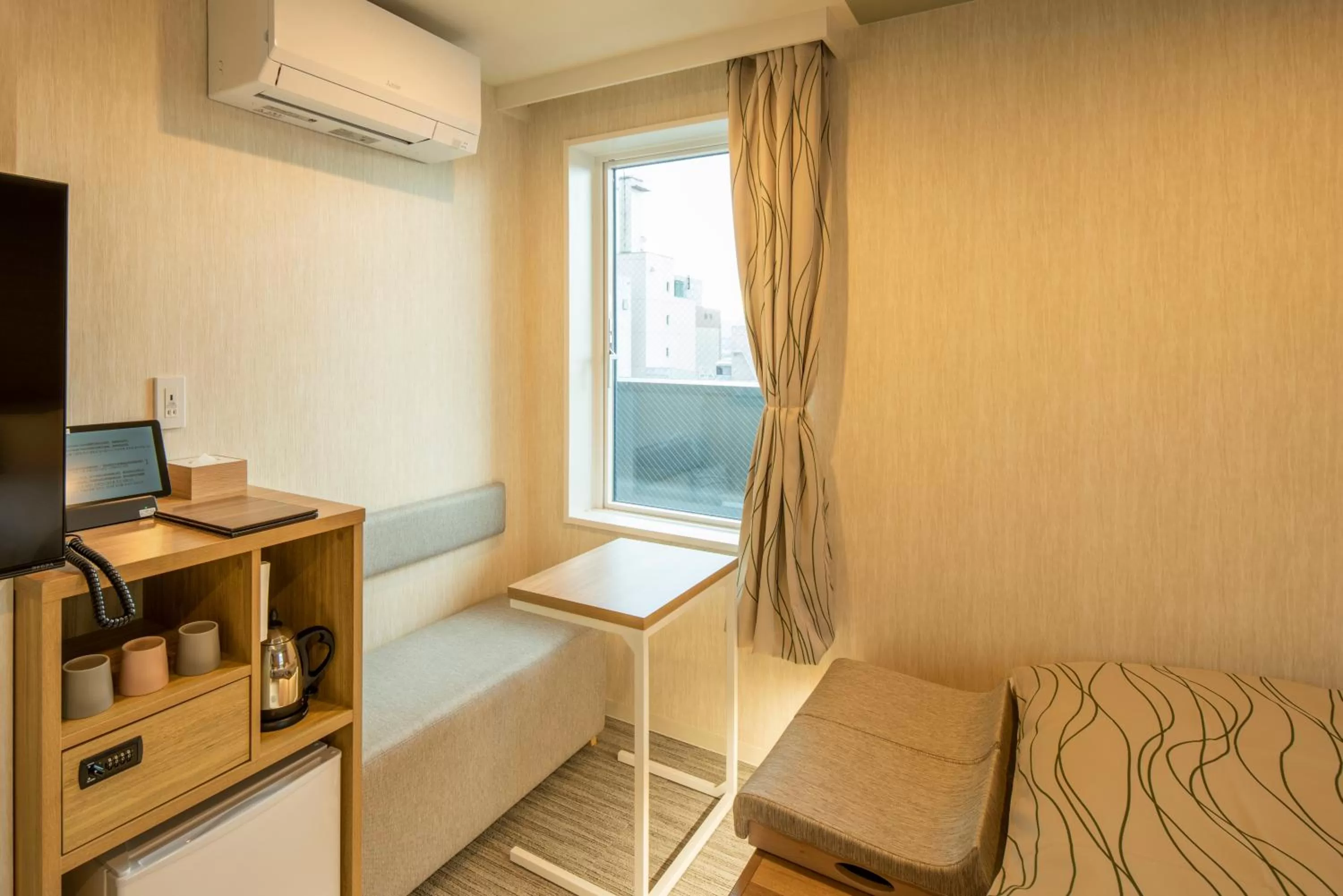 Photo of the whole room, Bed in HOTEL AMANEK Asahikawa