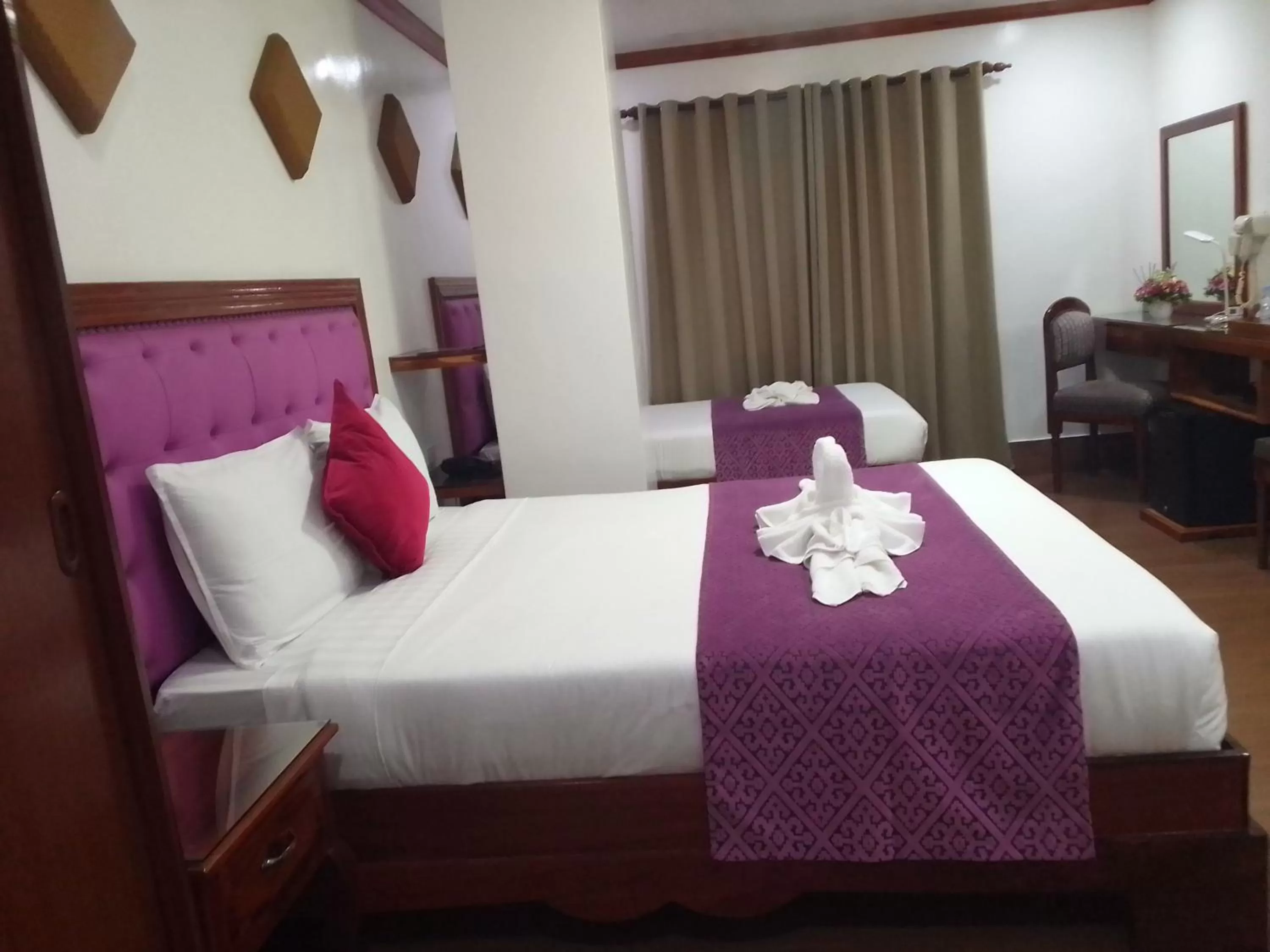 Bed in CLN Boutique Hotel