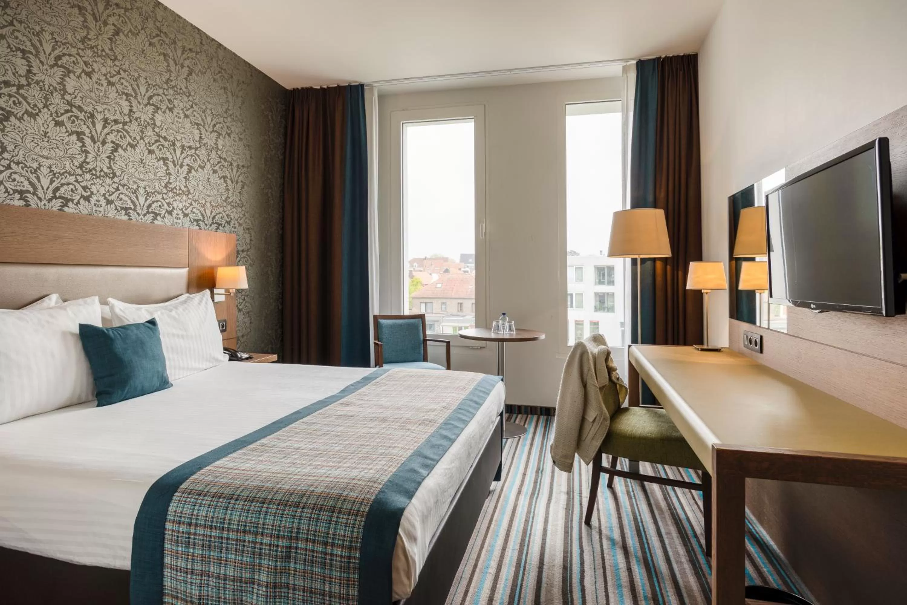 Photo of the whole room, Bed in Leopold Hotel Oudenaarde