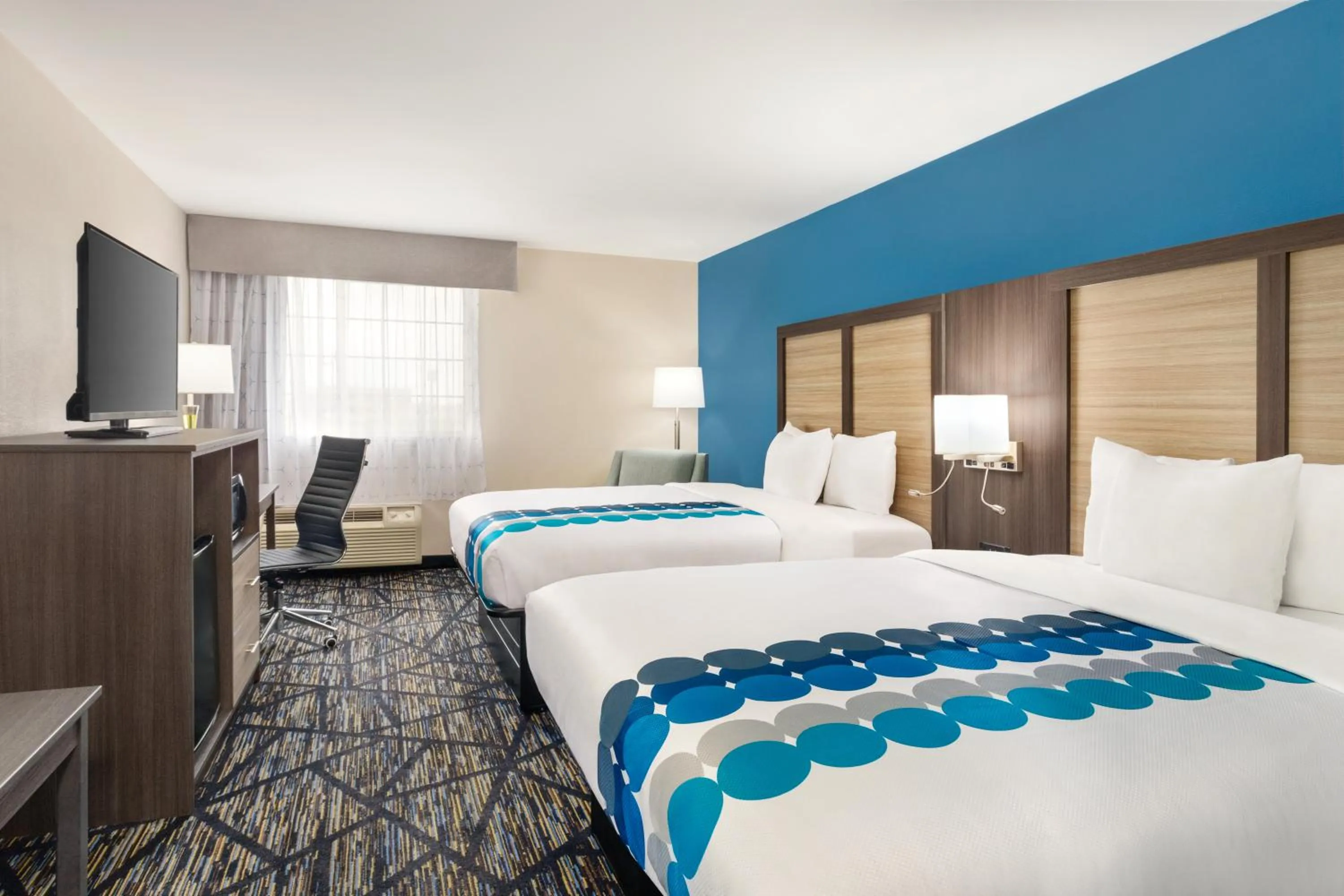 Bed in Baymont by Wyndham Blackwell I-35