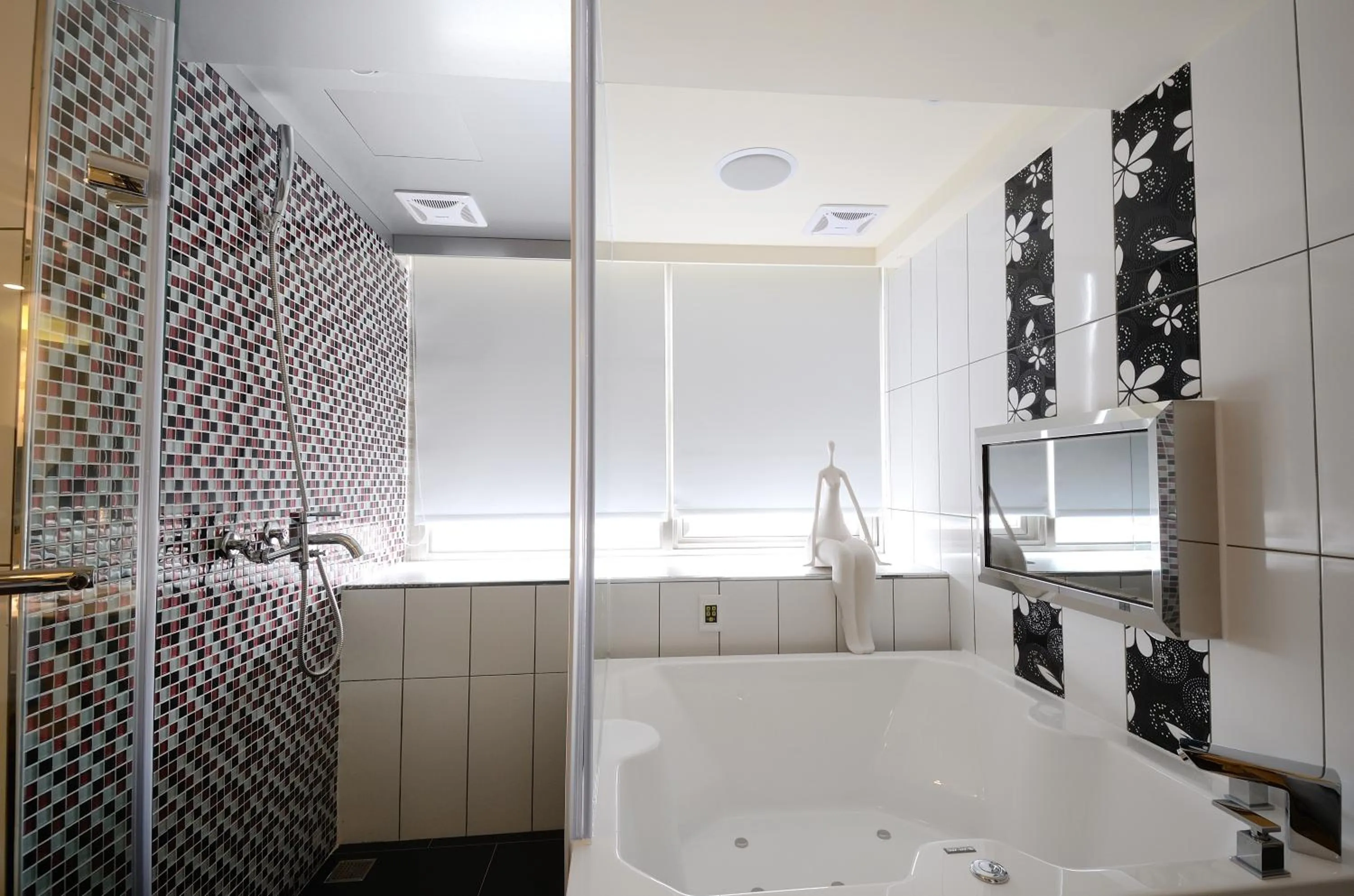 Bathroom in V-one Vogue Hotel