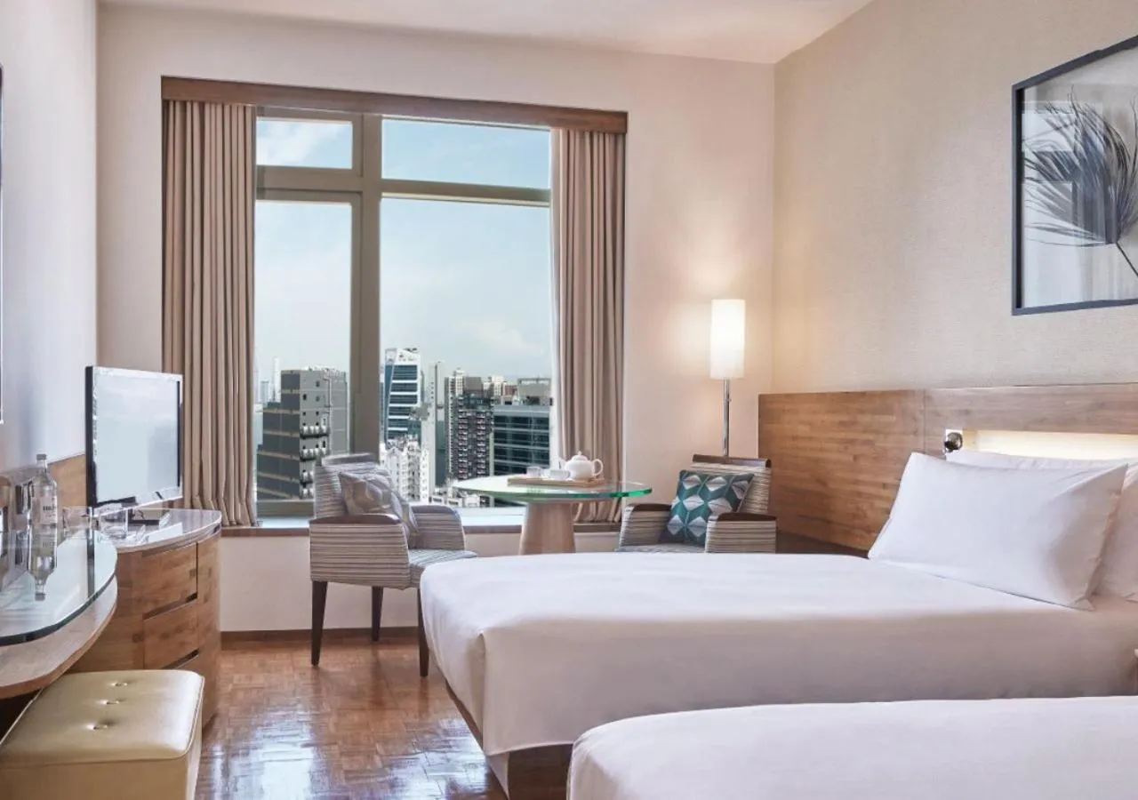 Bedroom, Bed in Nina Hotel Causeway Bay