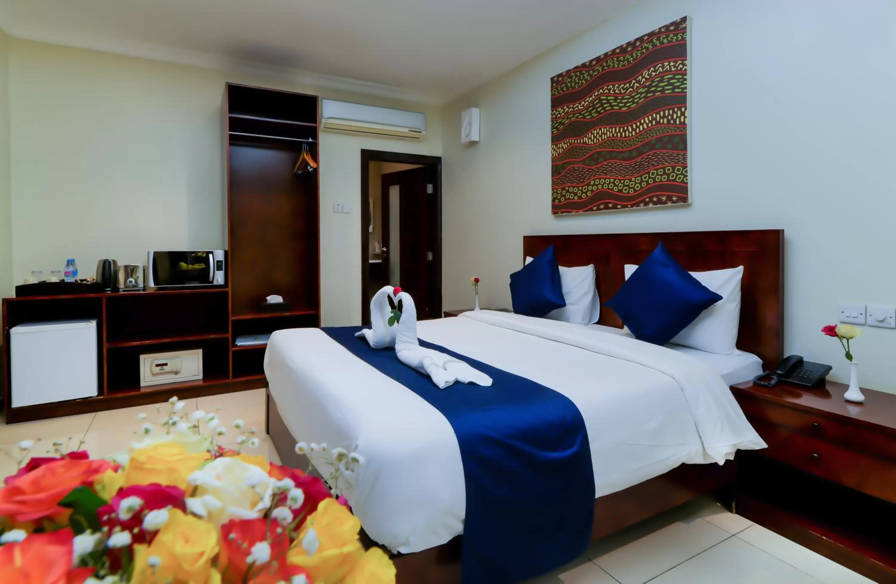 Bedroom, Bed in Tanzanite Executive Suites