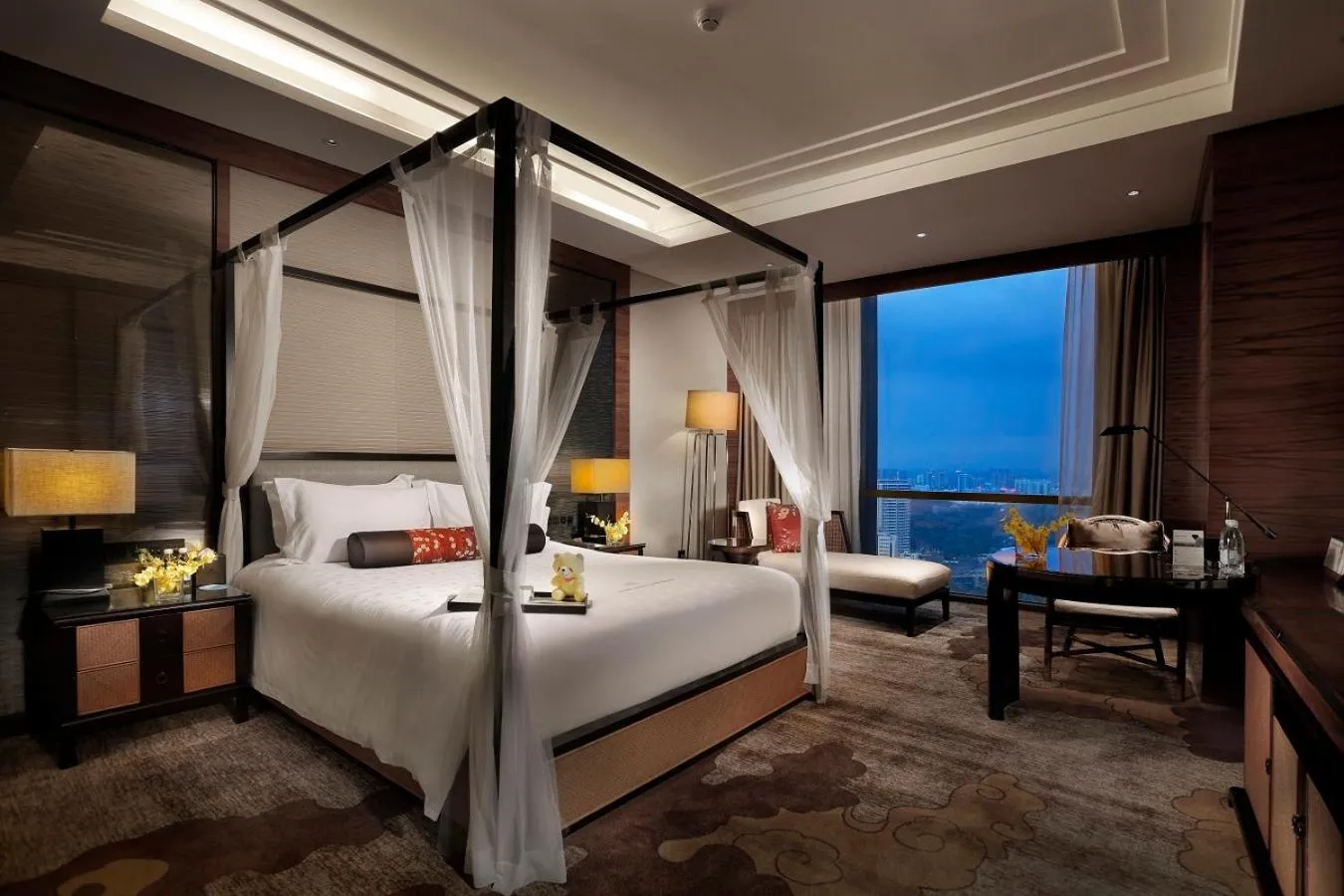 Bed in Dongguan Kande International Hotel