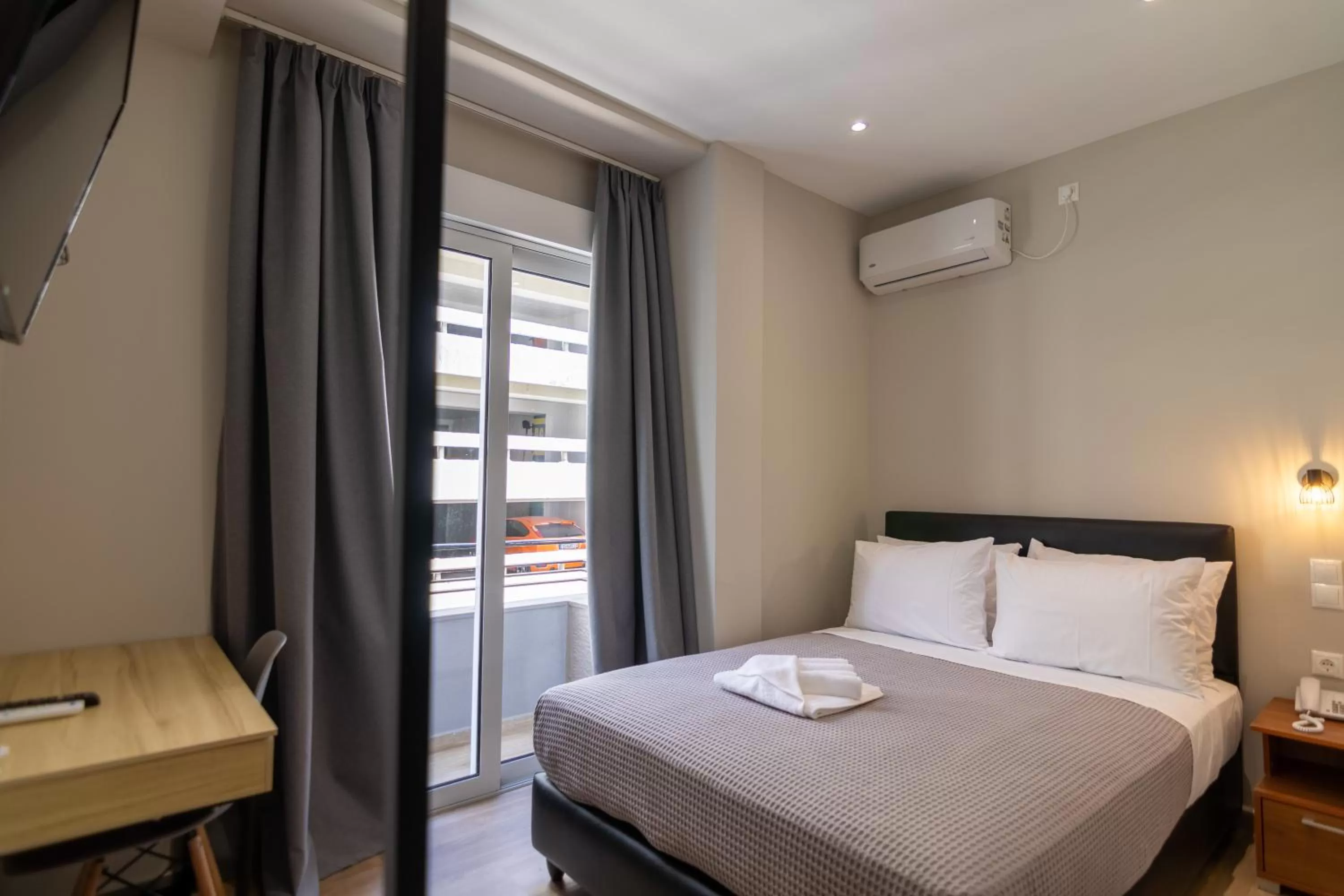 Photo of the whole room, Bed in New Amaryllis Hotel