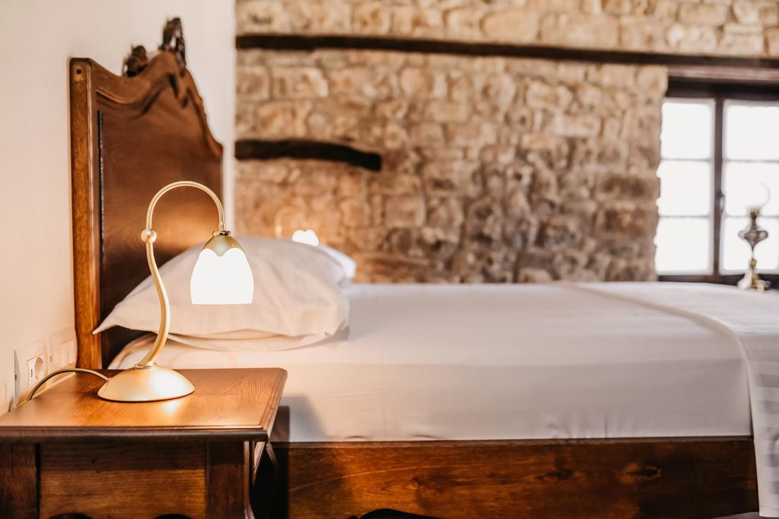 Bed in Beratino Hotel