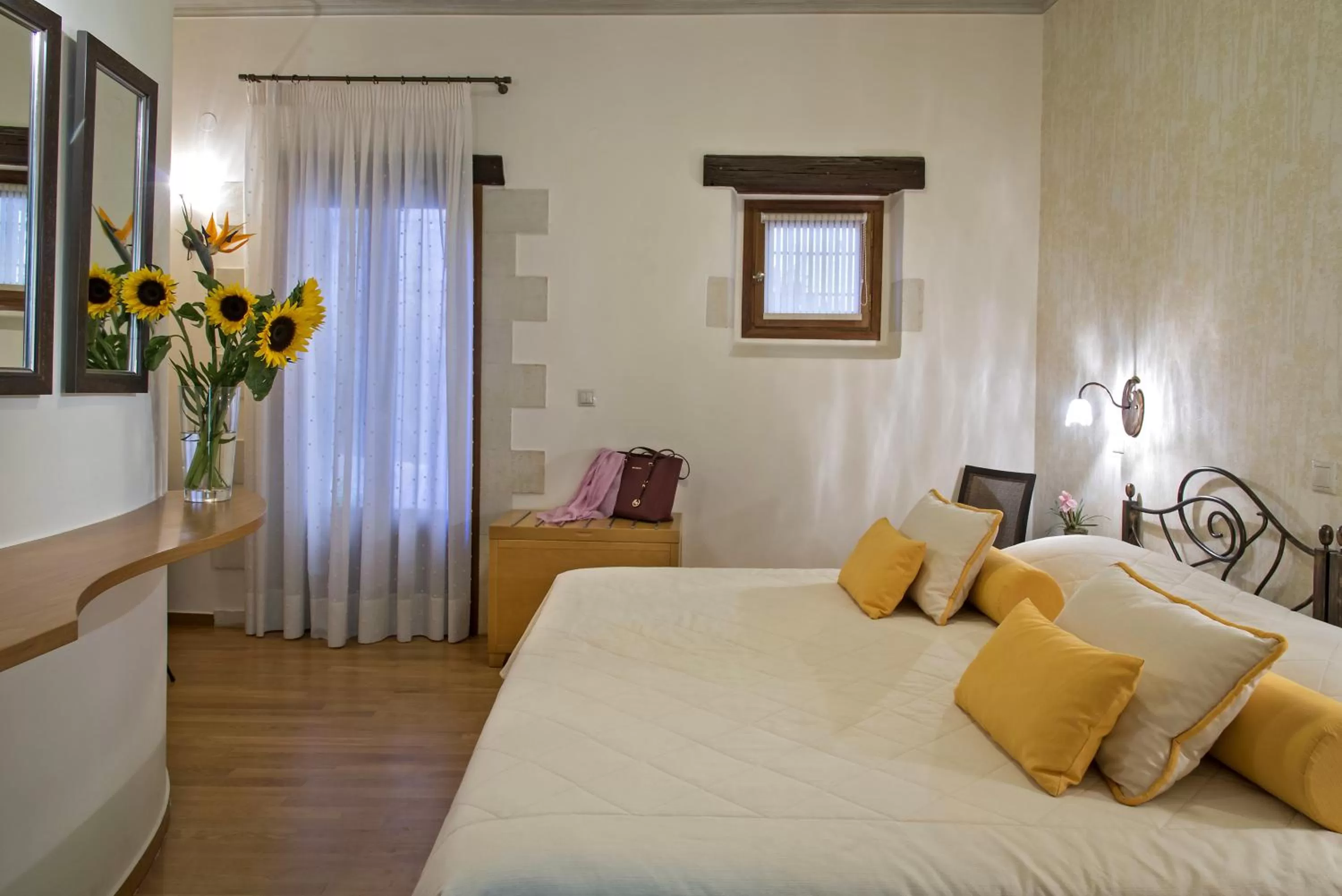 Bed in Ionas Boutique Hotel