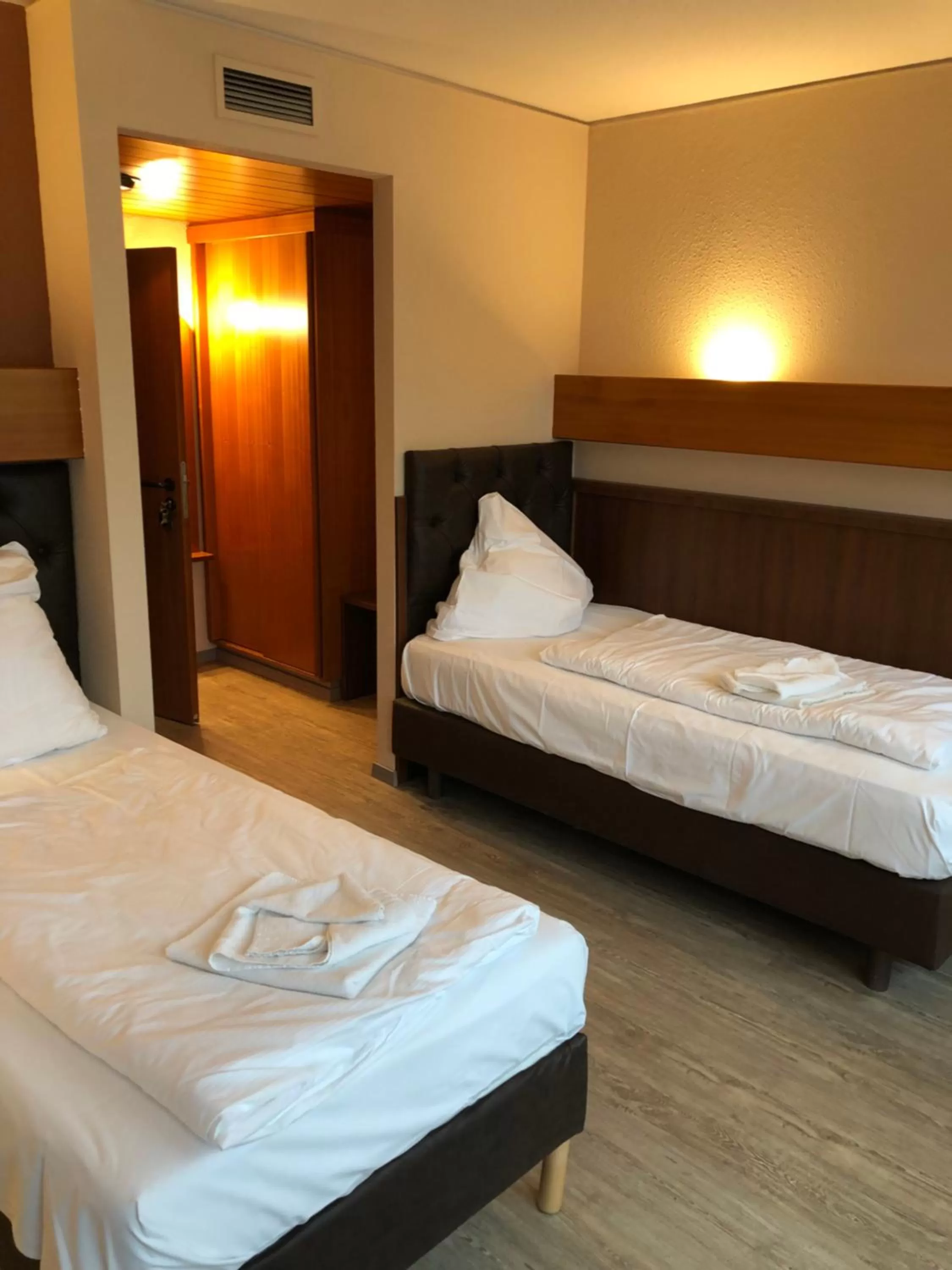 Bed in Hotel Poseidon