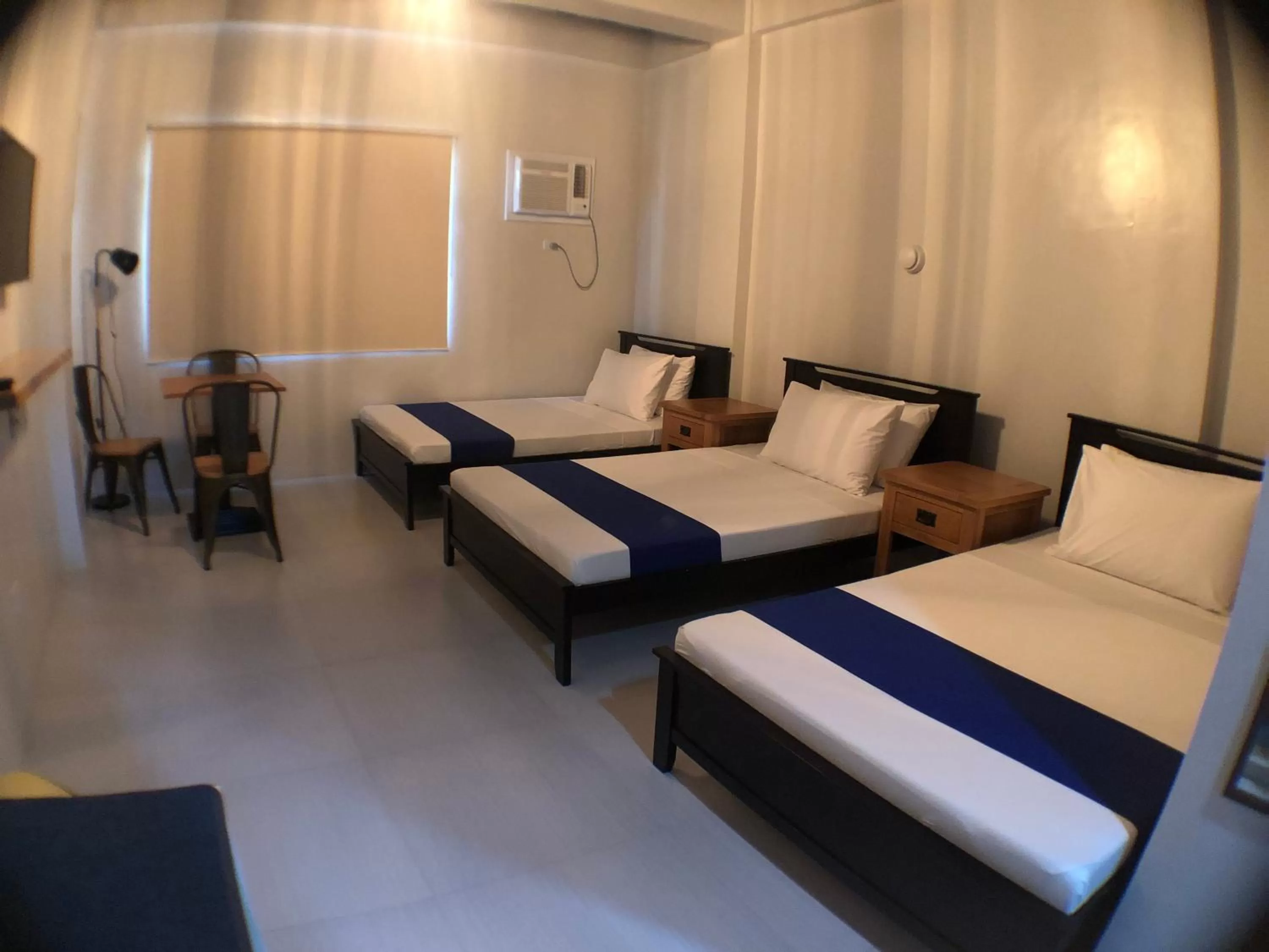 Bed in South Anchorage Inn