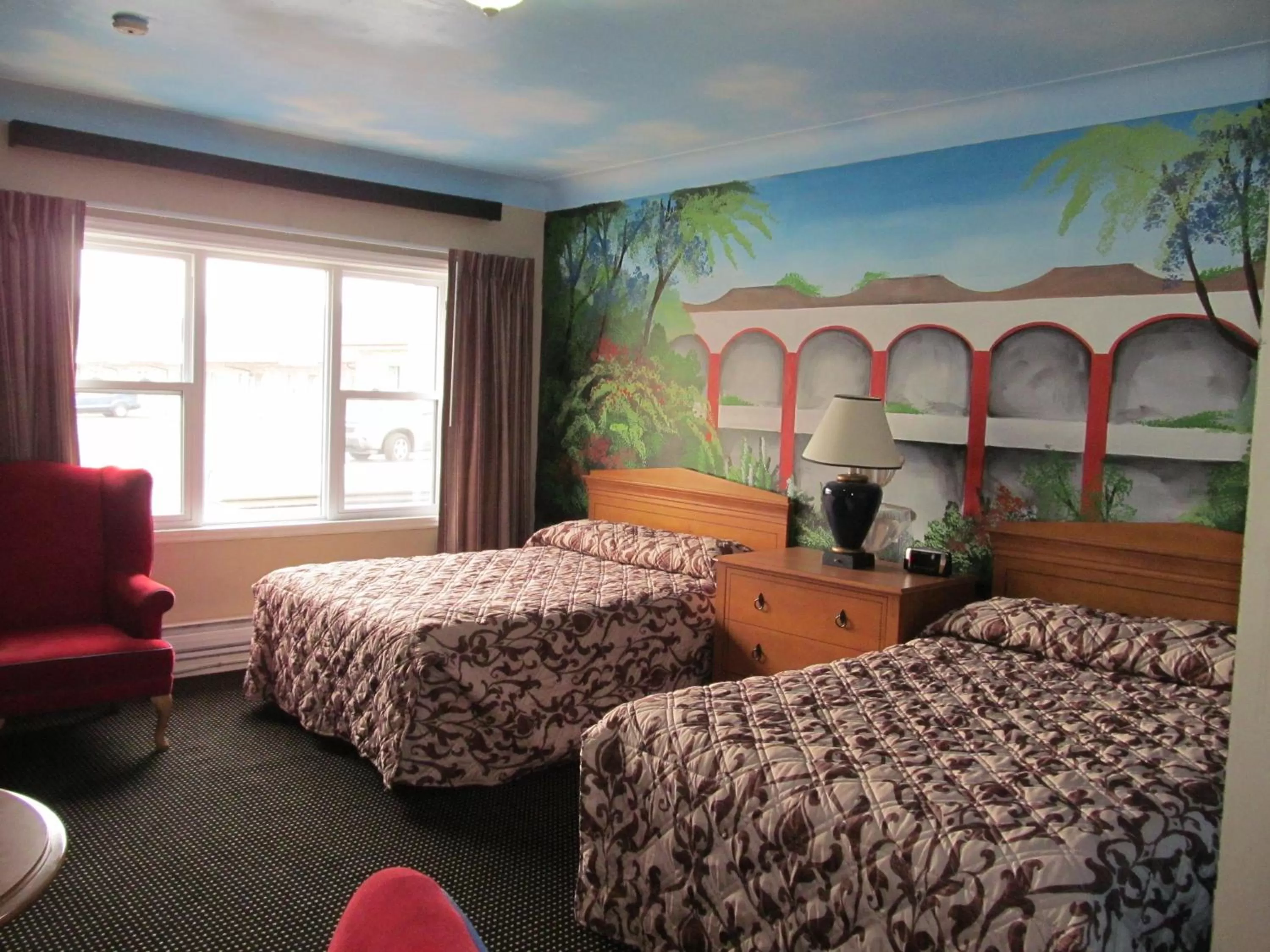 Photo of the whole room, Bed in Knights Inn London Ontario